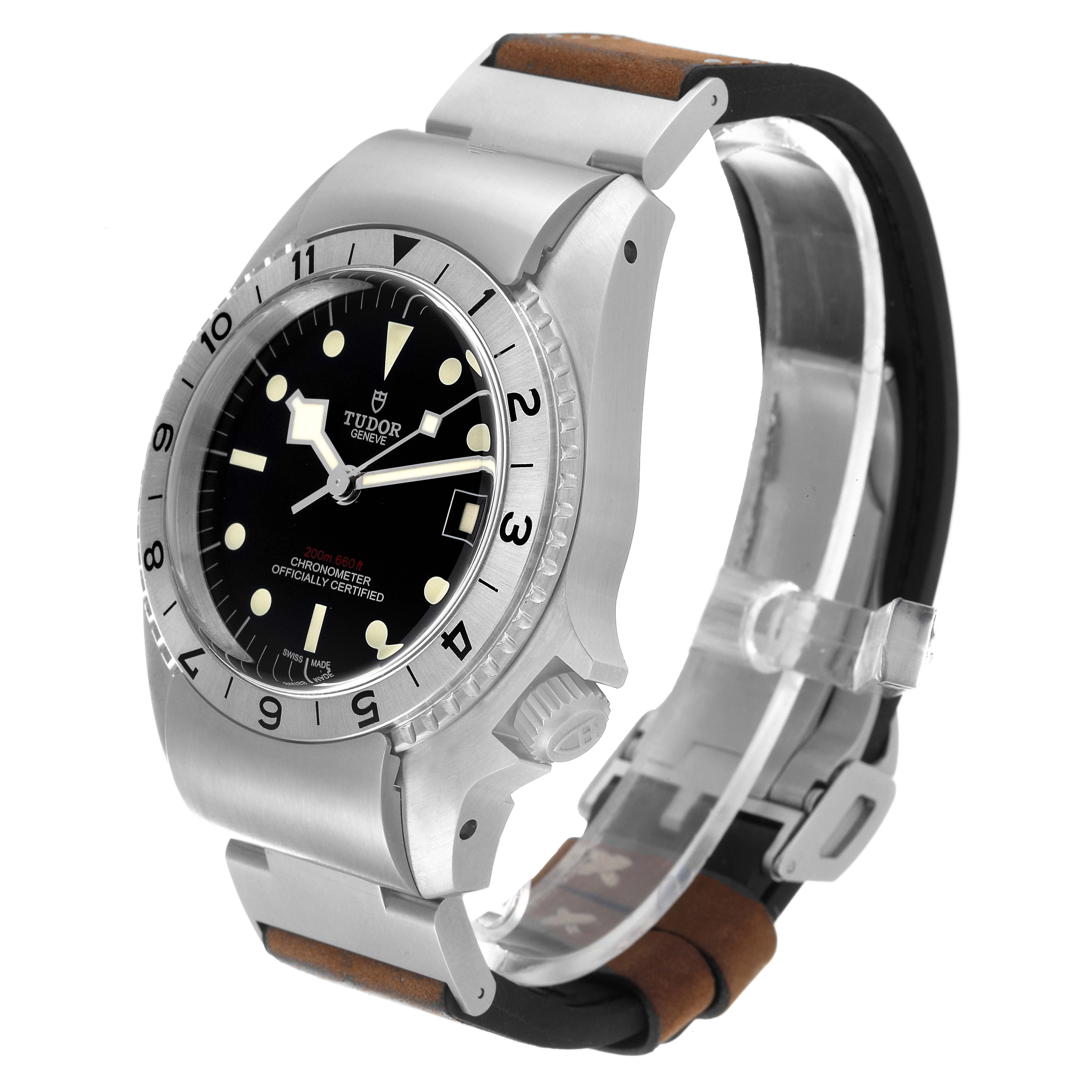 The image shows a side view of the Tudor Heritage Black Bay M70150-0001 Men
s Stainless Steel Black Dial M70150-0001 Men
s Stainless Steel Black Dial watch, highlighting its bezel, crown, and leather strap.