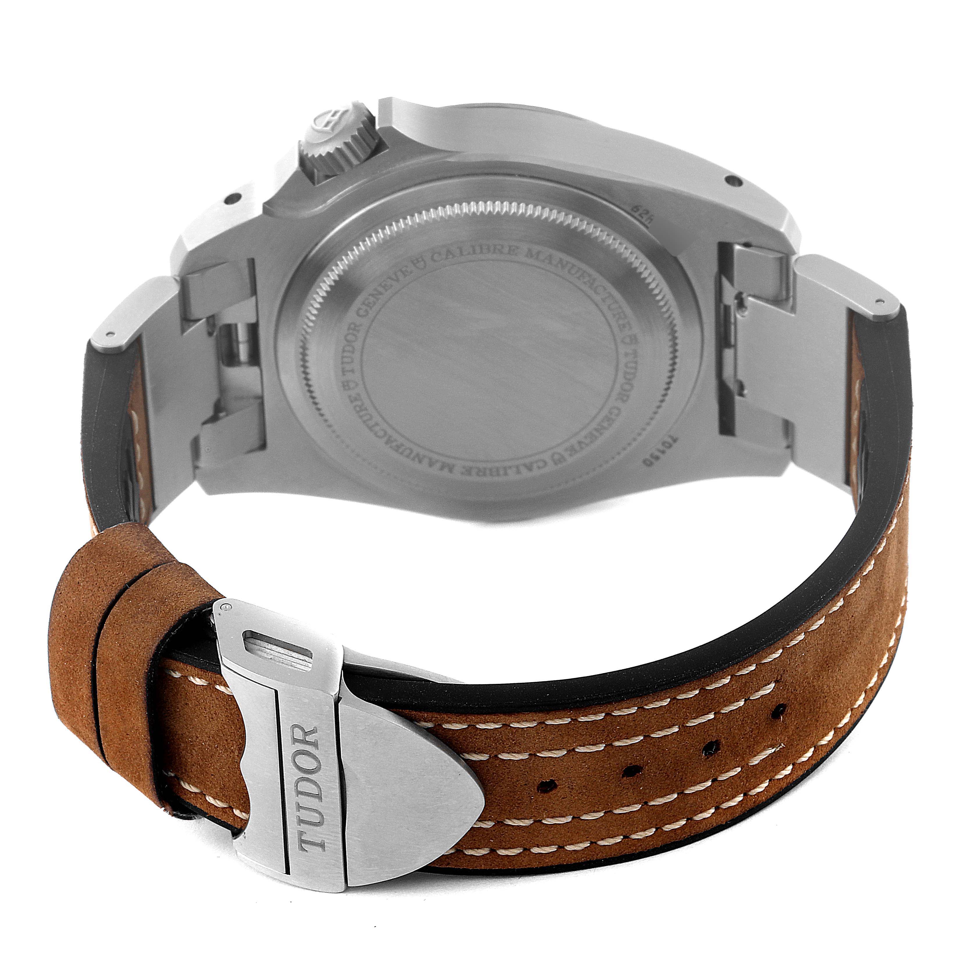 The image shows the back casing and strap of a Tudor Heritage Black Bay M70150-0001 Men
s Stainless Steel Black Dial M70150-0001 Men
s Stainless Steel Black Dial watch, highlighting its clasp and crown.