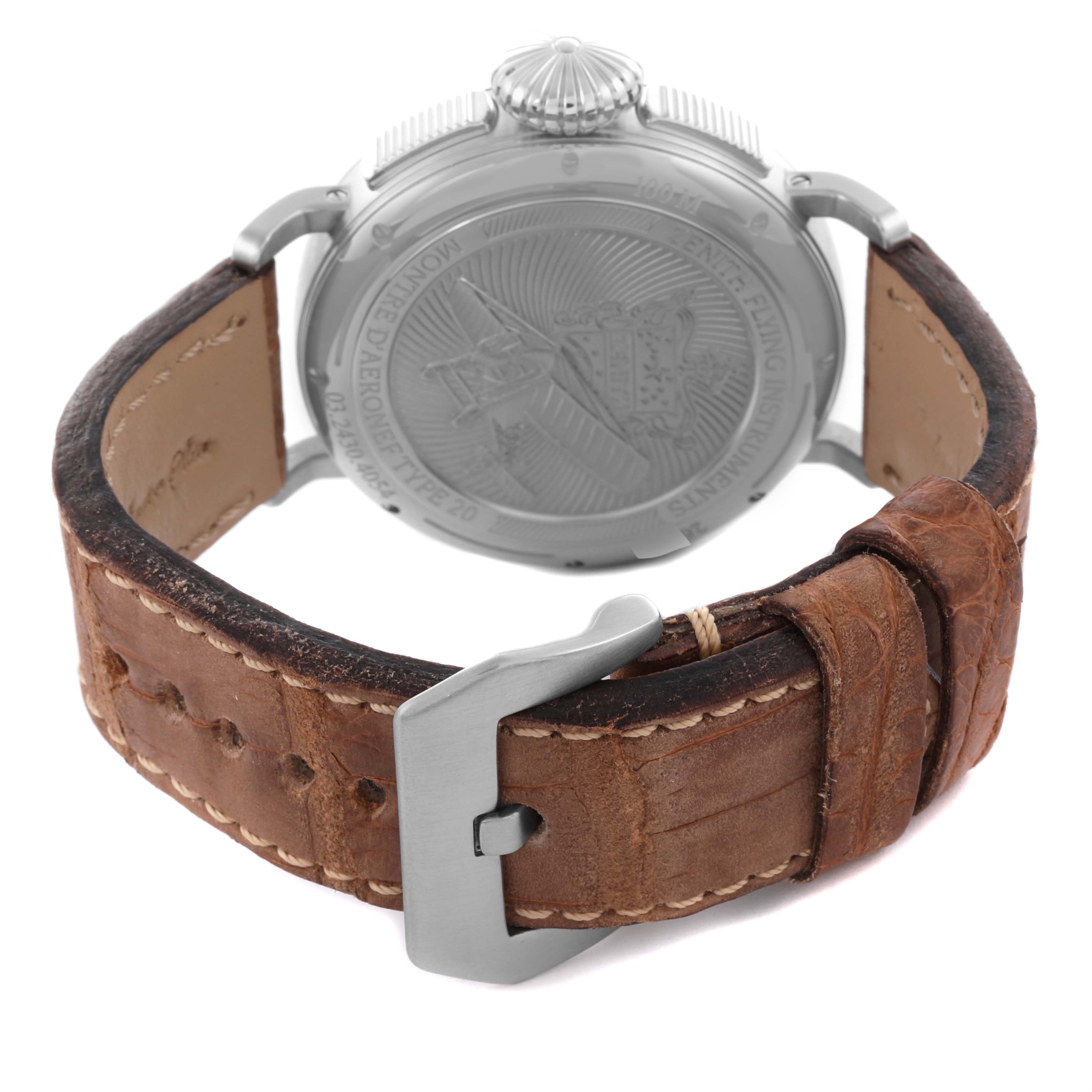 The image shows the back of a Zenith Pilot 03.2430.4054/21.C721 Men's Stainless Steel Black Dial 03.2430.4054/21.C721 Men's Stainless Steel Black Dial watch, highlighting the engraved case back, leather strap, and buckle clasp.