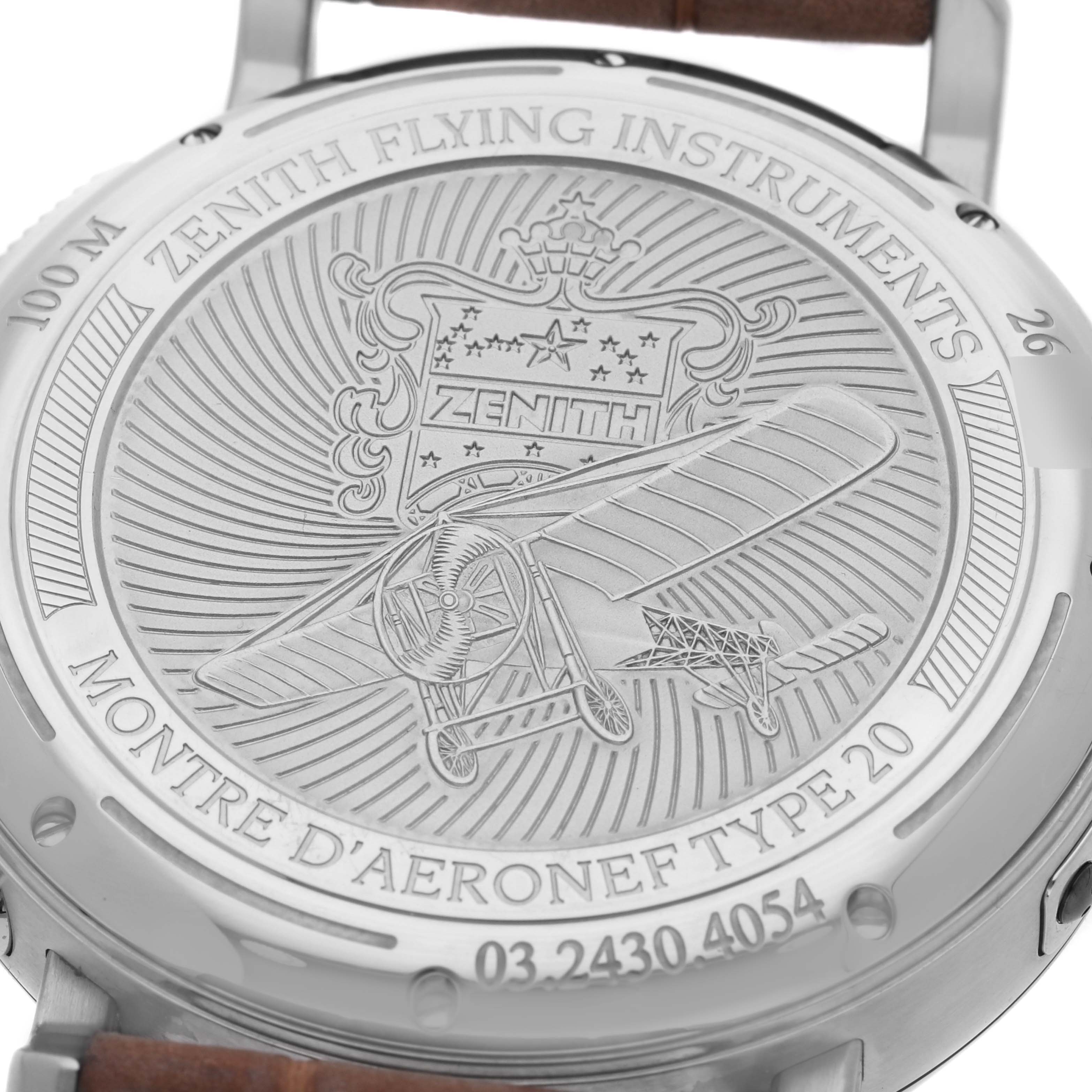 The image shows the back of a Zenith Pilot 03.2430.4054/21.C721 Men's Stainless Steel Black Dial 03.2430.4054/21.C721 Men's Stainless Steel Black Dial watch, featuring an engraved design and inscriptions.