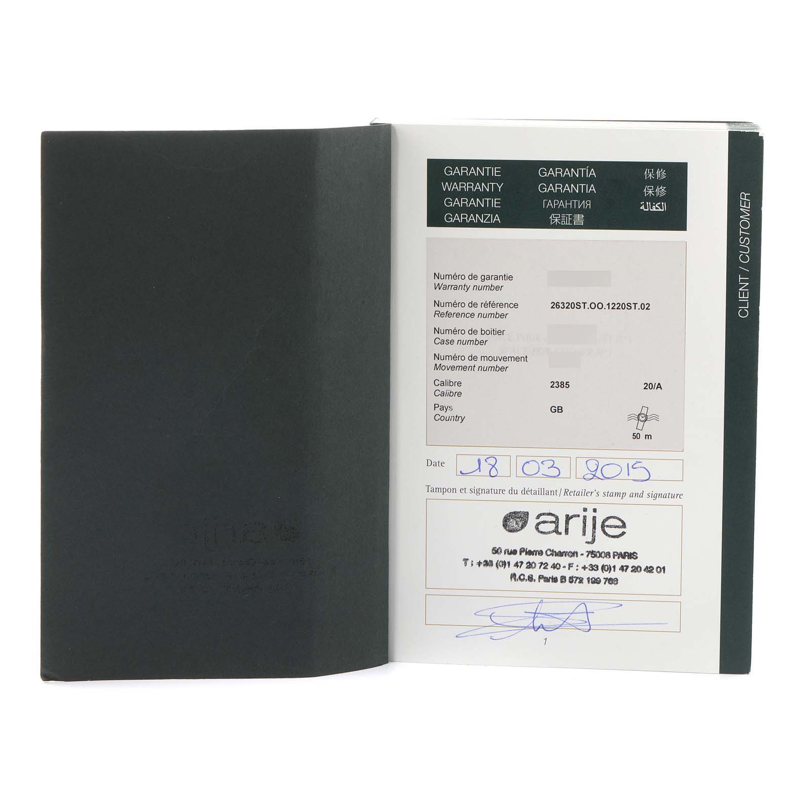 The image shows the warranty card inside a booklet for the Royal Oak watch by Audemars Piguet.