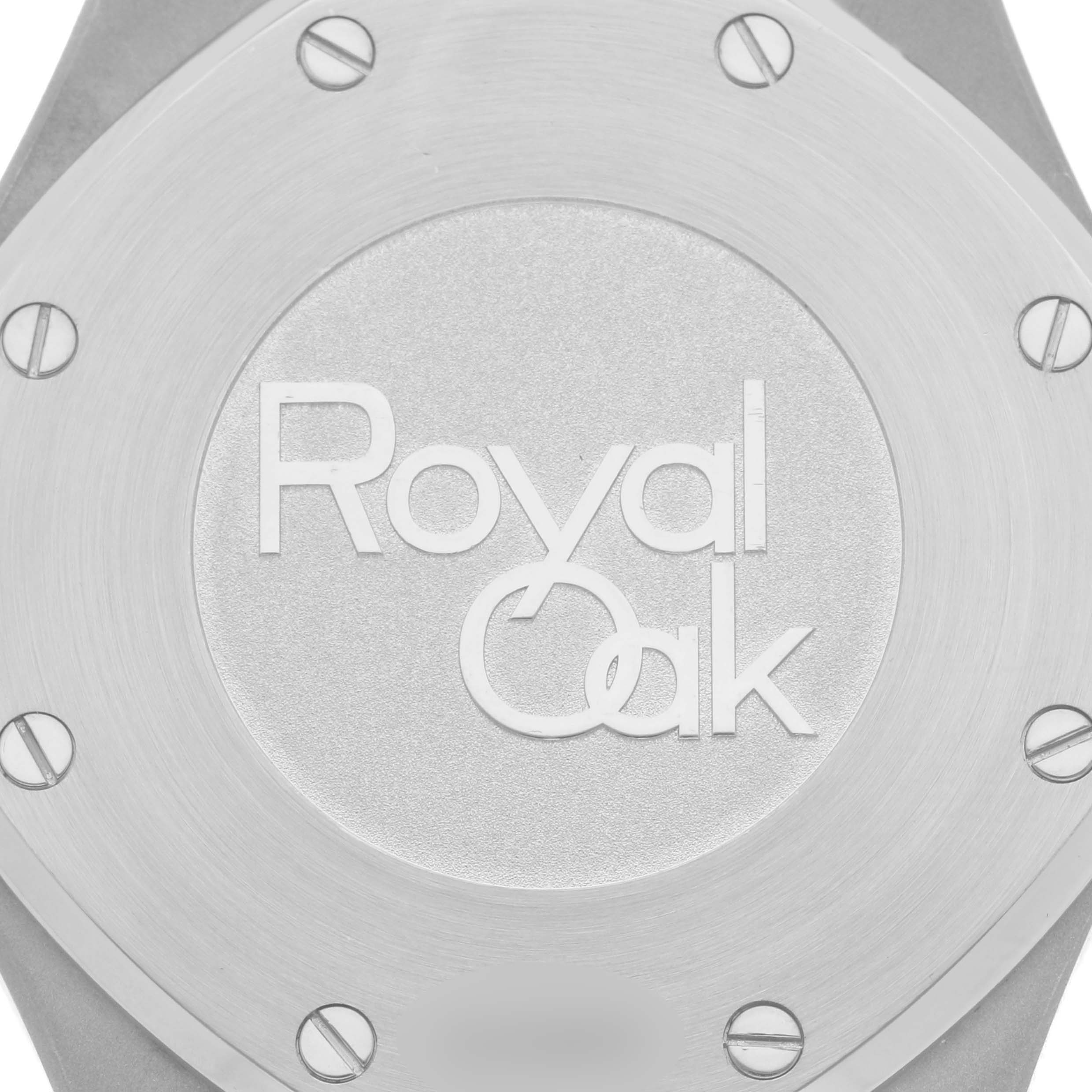 The image shows a close-up of the back side of the Audemars Piguet Royal Oak 26331ST.OO.1220ST.02 Men's Stainless Steel Black Dial 26331ST.OO.1220ST.02 Men's Stainless Steel Black Dial watch, highlighting the logo and screws.