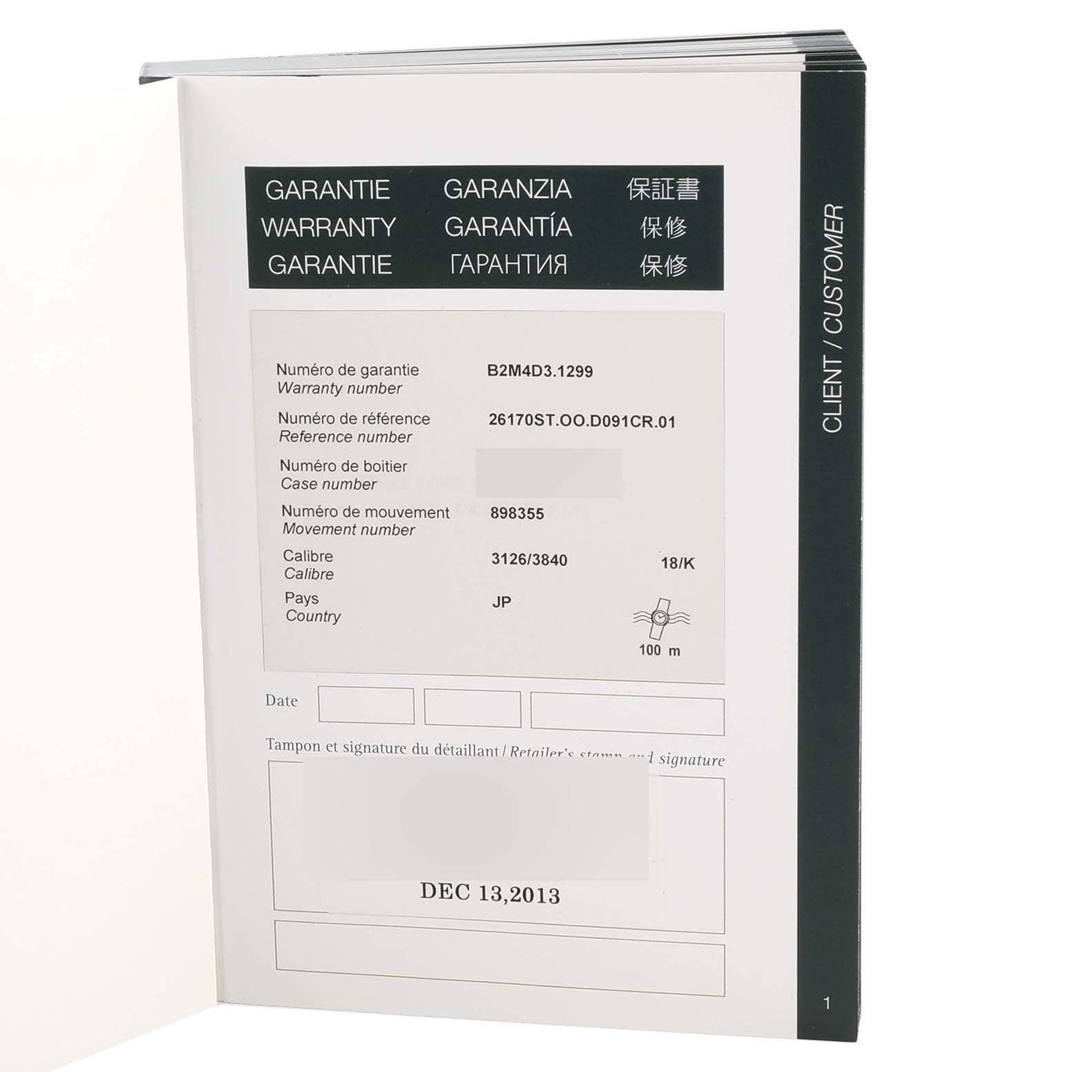 This image shows the warranty booklet for an Audemars Piguet Royal Oak Offshore 26170ST.OO.D091CR.01 Men's Stainless Steel Silver Dial 26170ST.OO.D091CR.01 Men's Stainless Steel Silver Dial model, displaying warranty details and reference numbers.