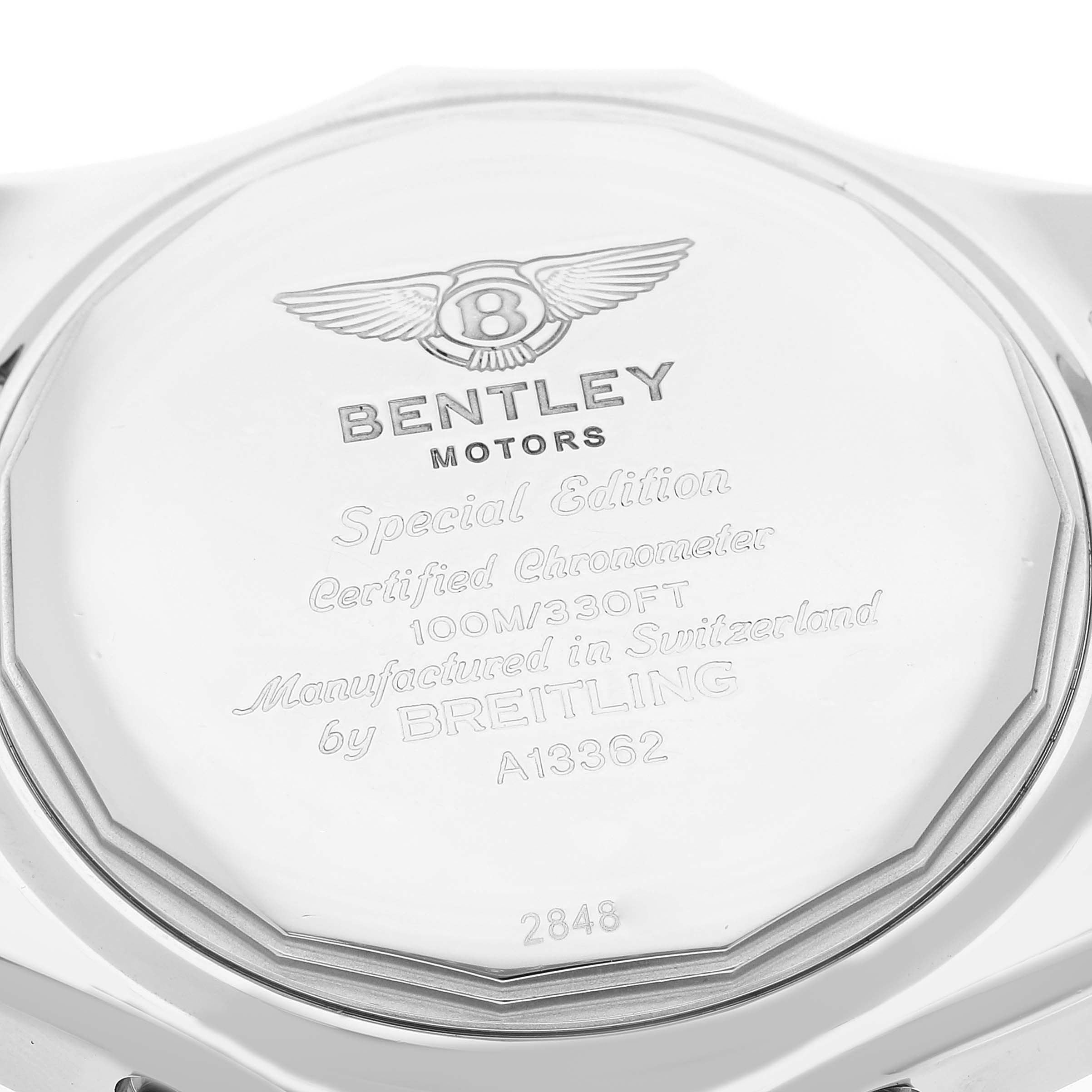 This image shows the back case of the Bentley model watch by Breitling, detailing its specifications and branding.