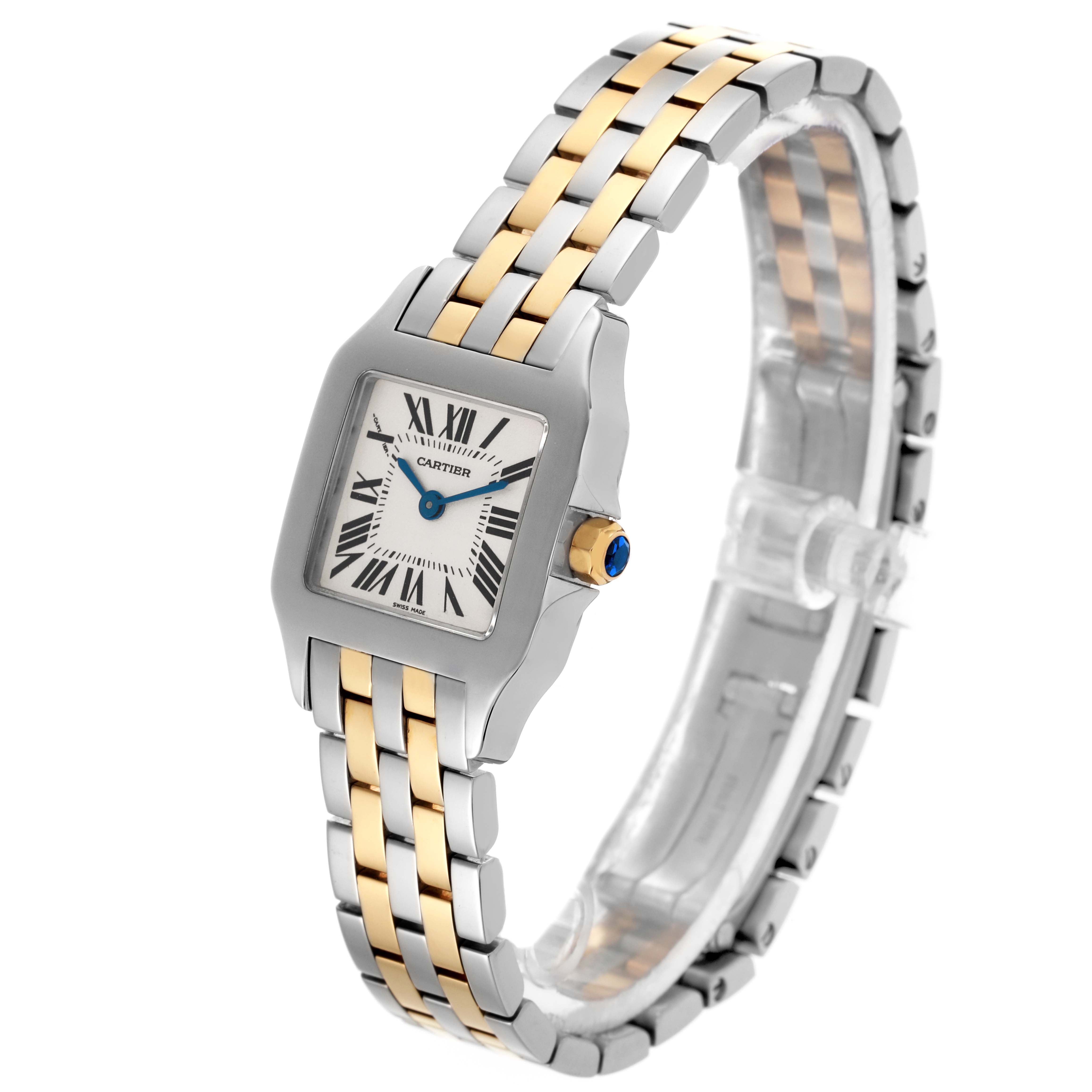 The Cartier Santos Demoiselle W25066Z6 Women
s Steel and Gold (two tone) Silver Dial W25066Z6 Women
s Steel and Gold (two tone) Silver Dial watch is shown at a three-quarter angle, displaying its face, bracelet, and crown detailing.
