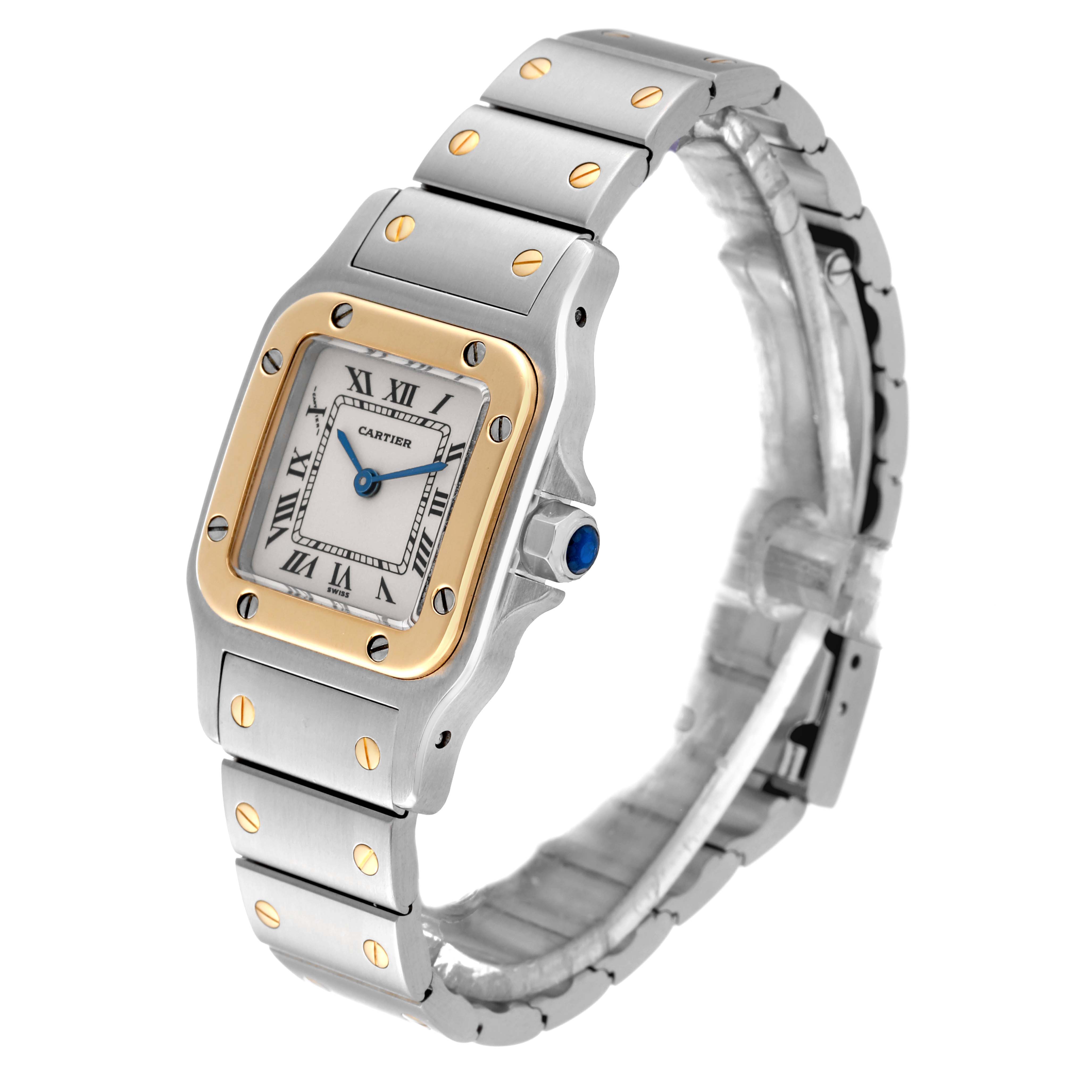 This image shows a side-front angle of the Cartier Santos W20012C4 Women's Steel and Gold (two tone) Silver Dial W20012C4 Women's Steel and Gold (two tone) Silver Dial watch, highlighting the face, bezel, and part of the bracelet.