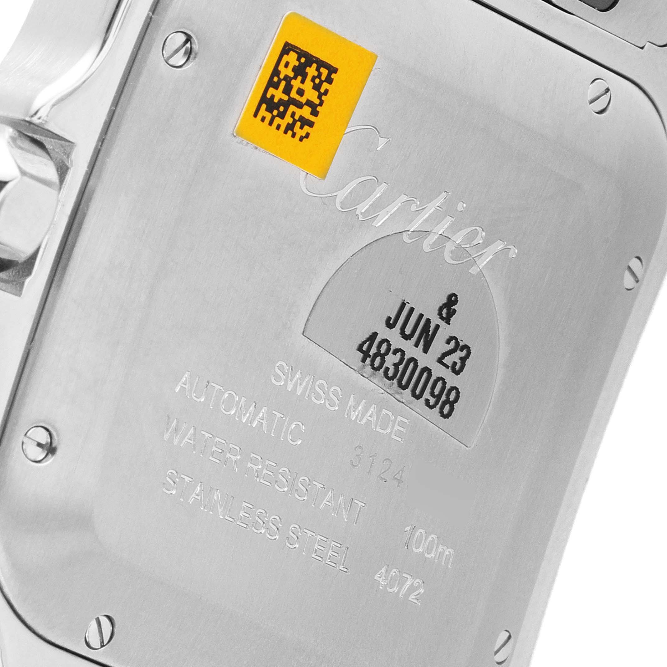 The image shows the back case of a Cartier Santos WSSA0030 Men's Stainless Steel Blue Dial WSSA0030 Men's Stainless Steel Blue Dial model watch, highlighting engravings and a QR code.