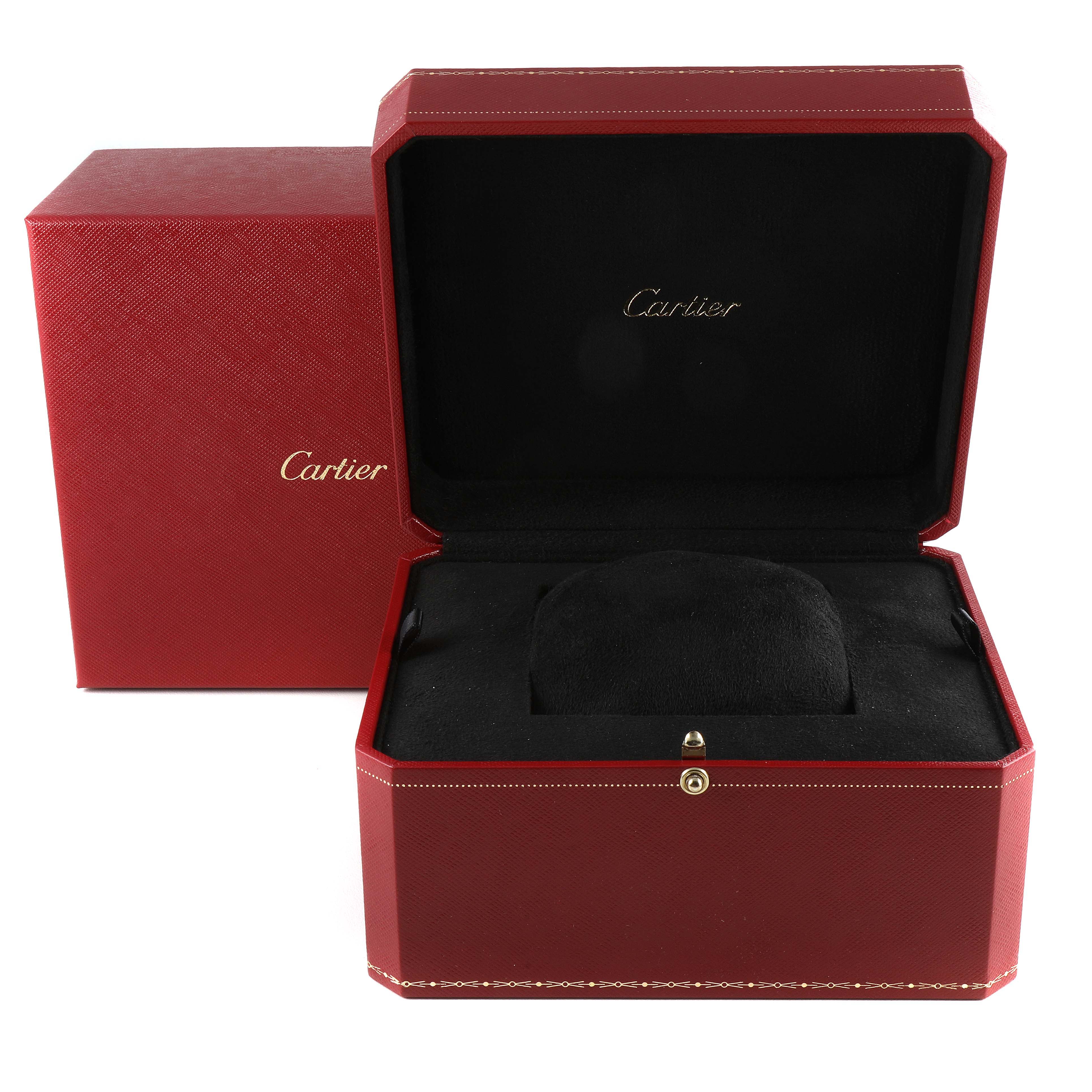 The image shows an open red Cartier watch box for the Tank Americaine model, with a black interior cushion.