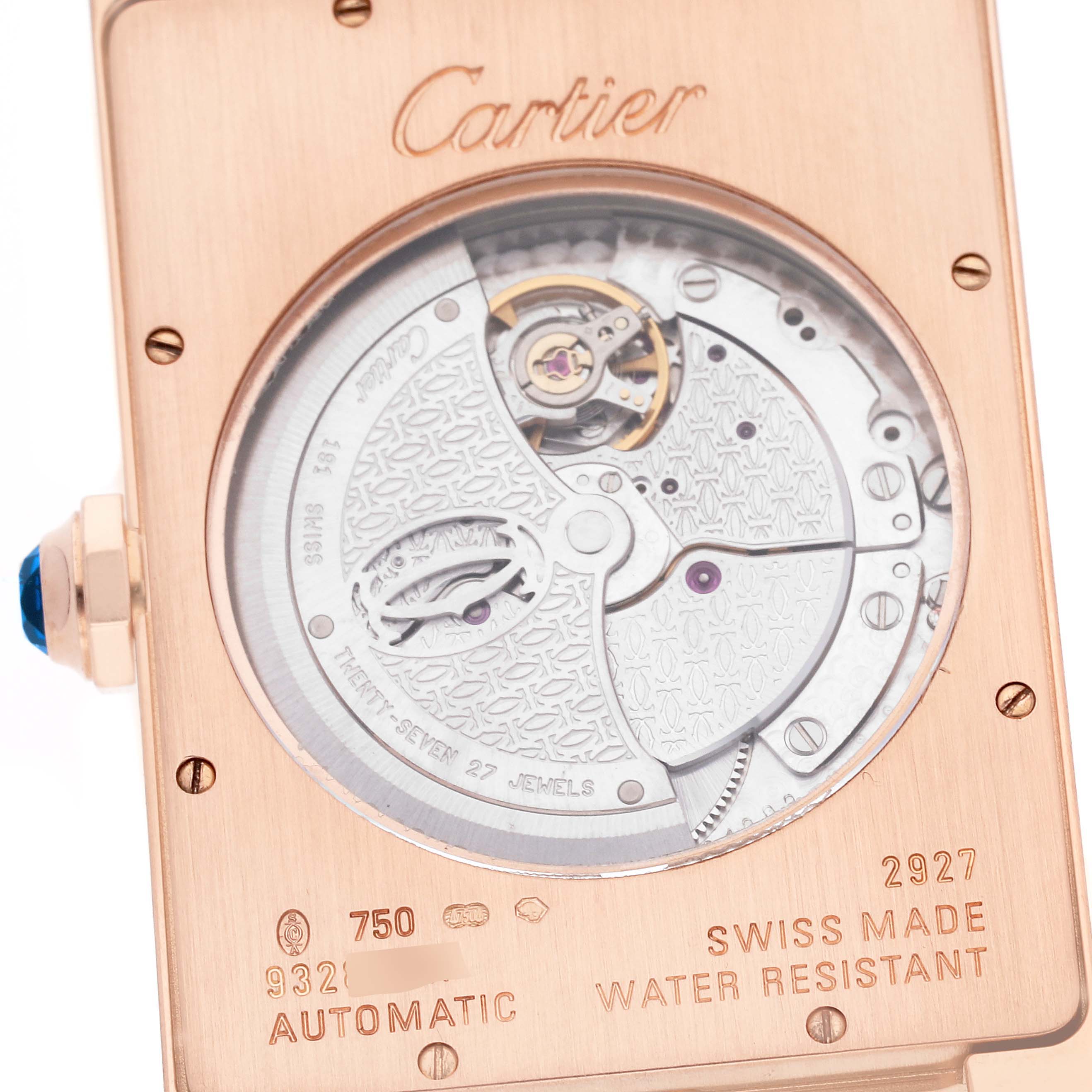 This image shows the back view of a Cartier Tank Americaine W2609856 Men
s Rose Gold Silver Dial W2609856 Men
s Rose Gold Silver Dial watch, highlighting its mechanical movement and inscriptions.
