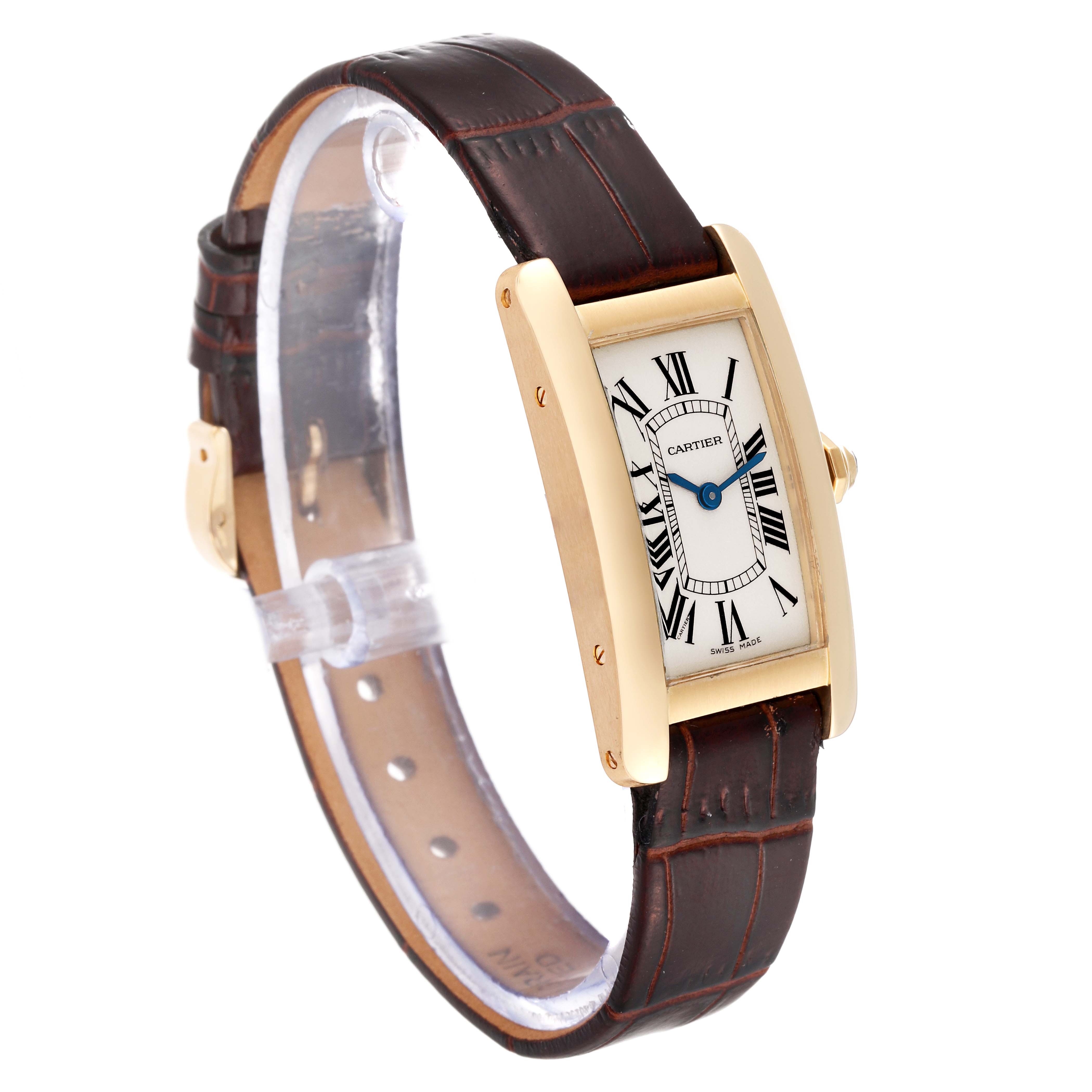 This image shows the Cartier Tank Americaine W26015K2 Women's Yellow Gold Silver Dial W26015K2 Women's Yellow Gold Silver Dial watch from a front-side angle, highlighting the face and brown leather strap.