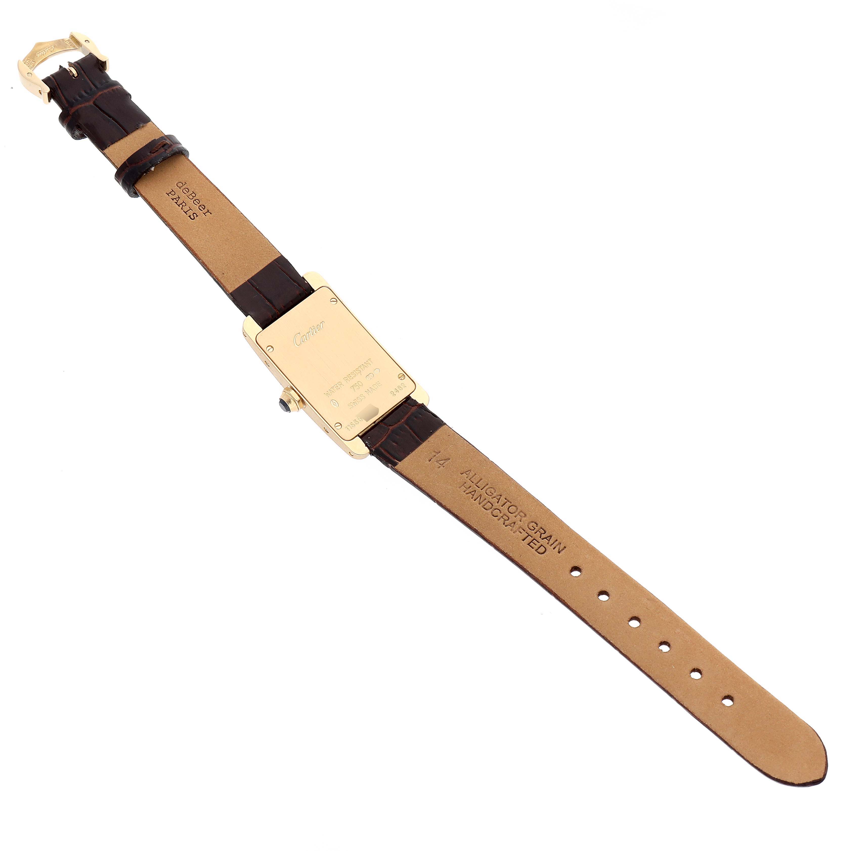 The image shows the back side of the Cartier Tank Américaine watch, including the leather strap and the case back.