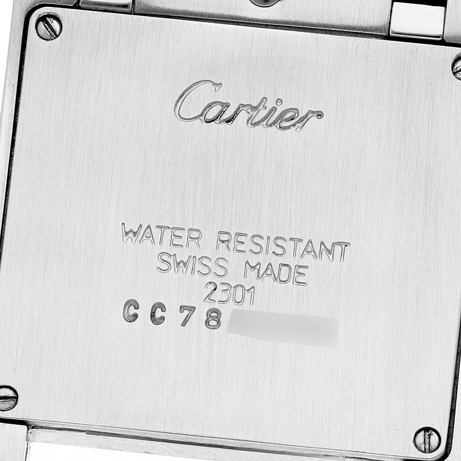 The image shows the case back of a Cartier Tank Francaise W2TA0003 Women's Steel and Gold (two tone) Silver Dial W2TA0003 Women's Steel and Gold (two tone) Silver Dial watch with engraved details.