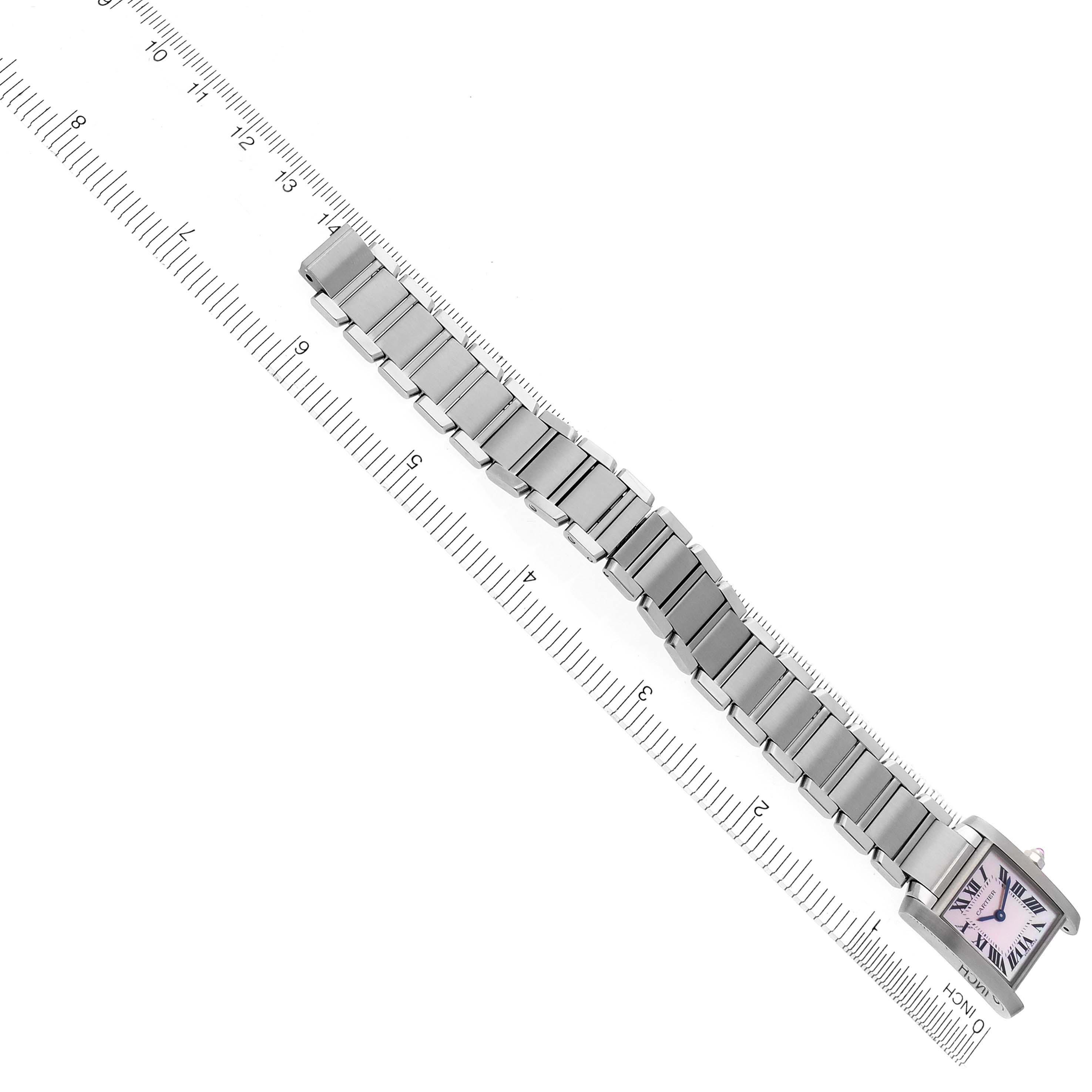 The Cartier Tank Francaise W51028Q3 Women's Stainless Steel Mother of Pearl Dial W51028Q3 Women's Stainless Steel Mother of Pearl Dial watch is shown from a top view, highlighting the face and full metal bracelet, with a ruler for scale.