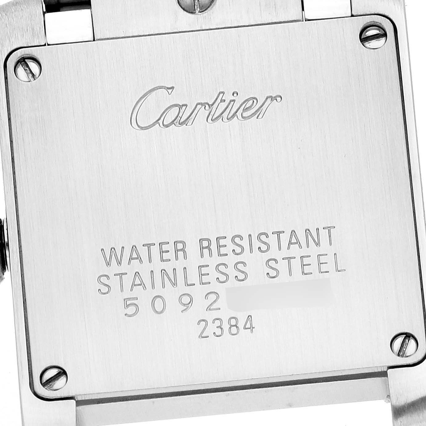 This image shows the back case of a Cartier Tank Francaise W51008Q3 Women's Stainless Steel Silver Dial W51008Q3 Women's Stainless Steel Silver Dial watch, highlighting the branding and specifications.