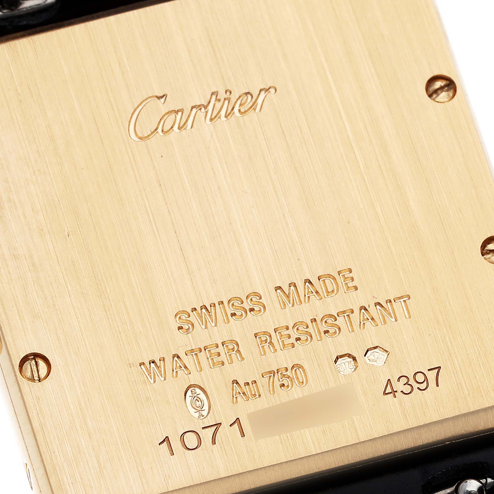 This image shows the back case of the Cartier Tank Louis WGTA0067 Men's Yellow Gold Silver Dial WGTA0067 Men's Yellow Gold Silver Dial watch, highlighting engravings such as "Cartier," "Swiss Made," and "Water Resistant."