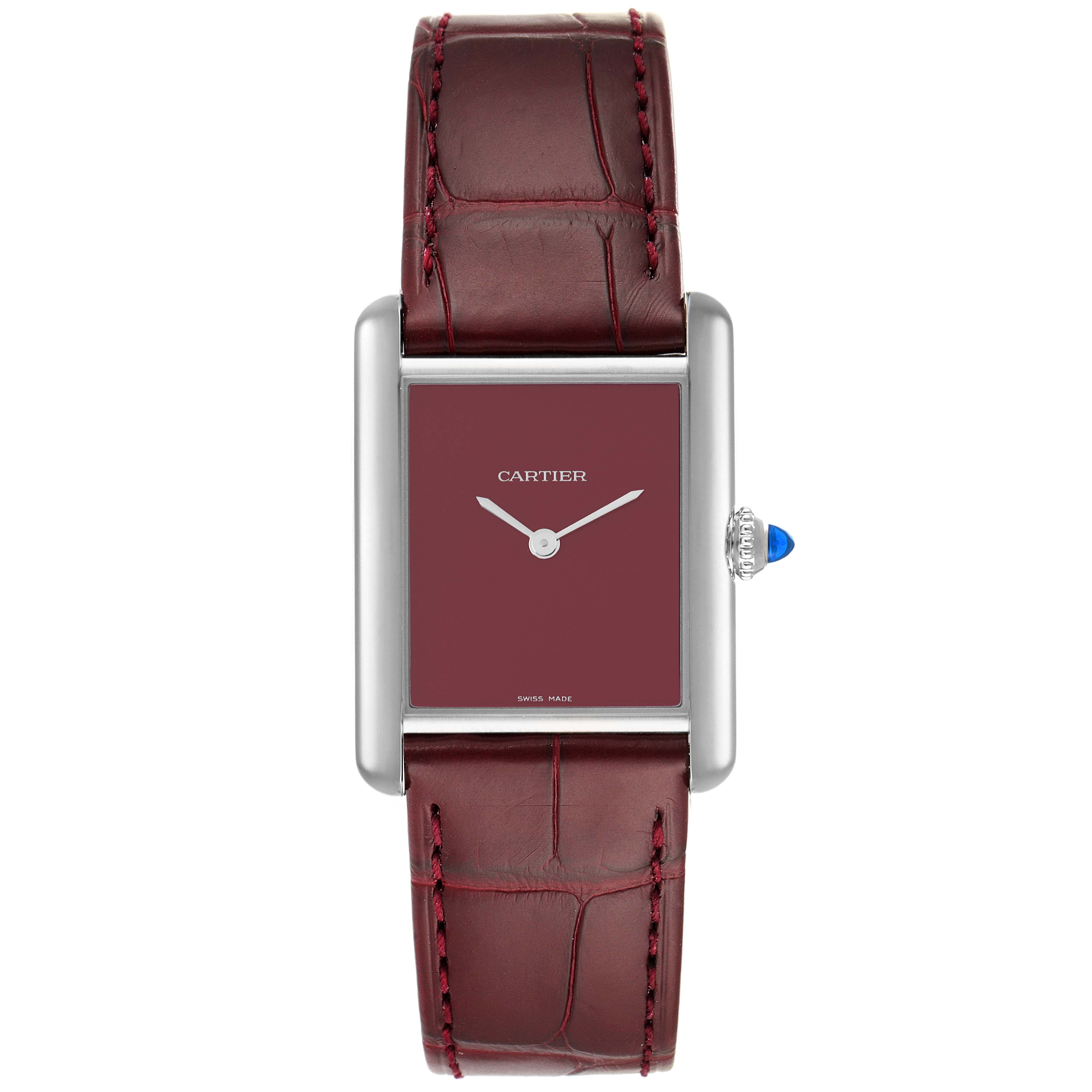 The image shows a front view of the Cartier Tank Must WSTA0054 Women's Stainless Steel Red Dial WSTA0054 Women's Stainless Steel Red Dial watch, featuring its burgundy dial and leather strap.