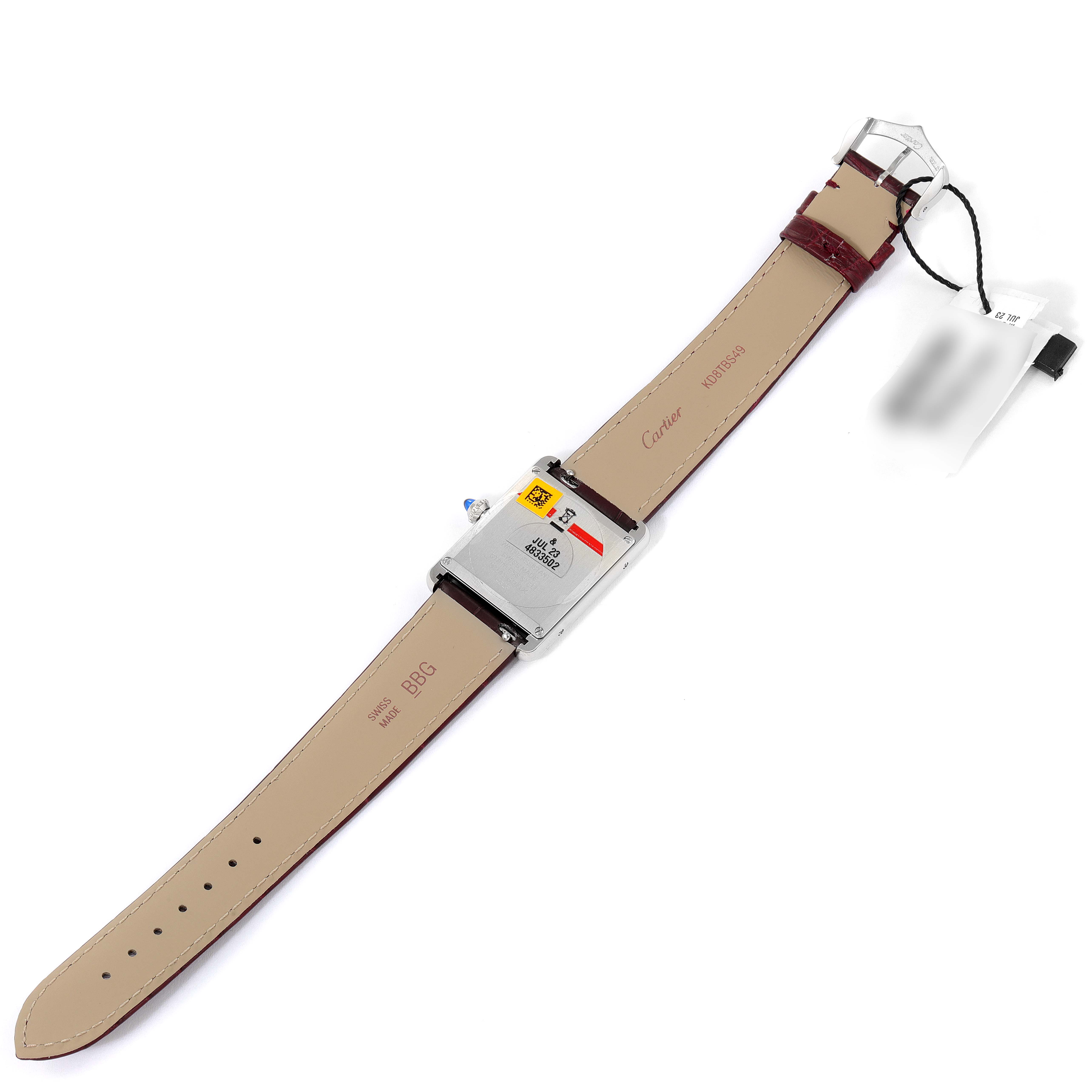 The image shows the back view of the Cartier Tank Must WSTA0054 Women's Stainless Steel Red Dial WSTA0054 Women's Stainless Steel Red Dial watch, displaying the strap and the case back.