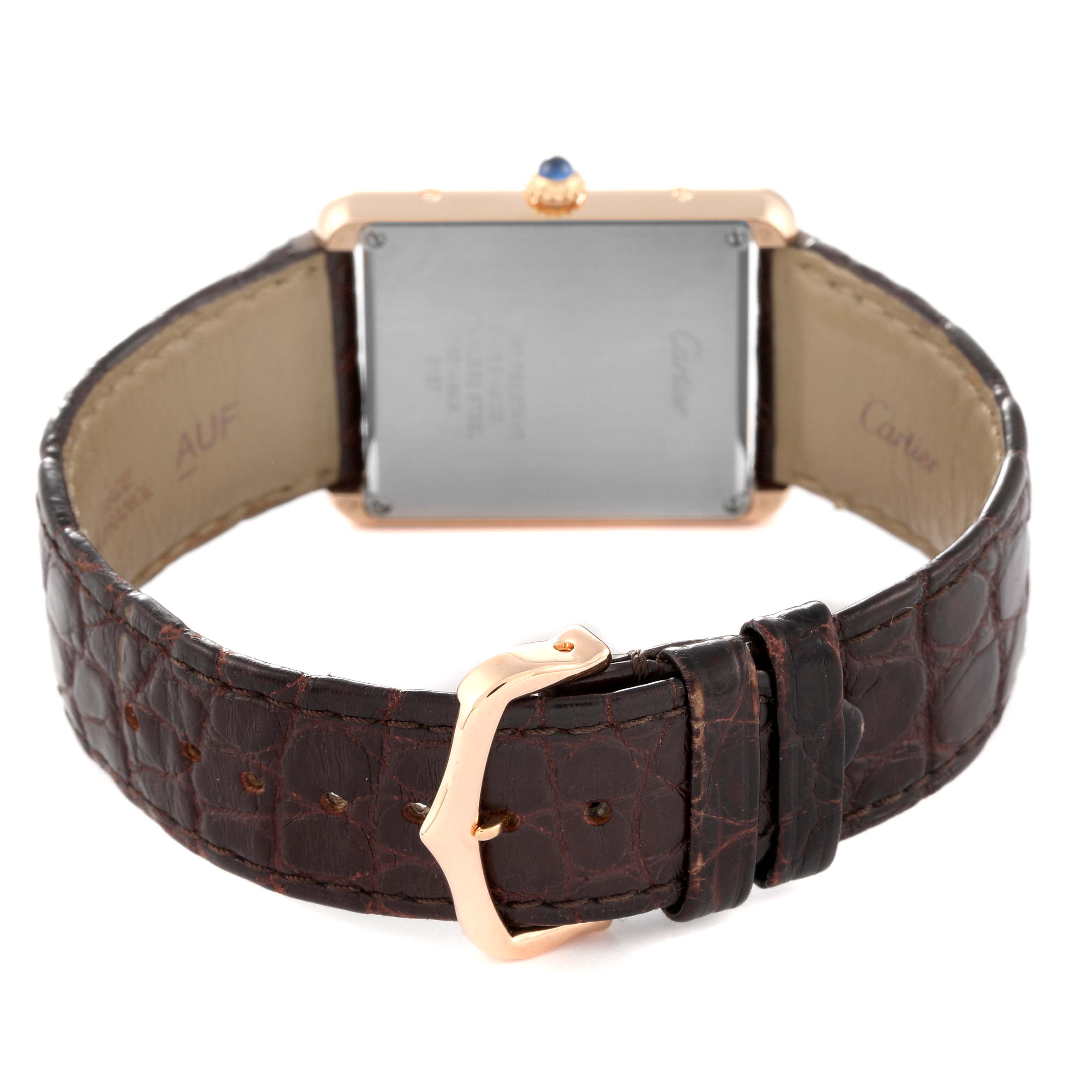 The image shows the back of a Cartier Tank Solo W5200025 Men's Steel and Gold (two tone) Silver Dial W5200025 Men's Steel and Gold (two tone) Silver Dial watch, highlighting its strap and buckle.