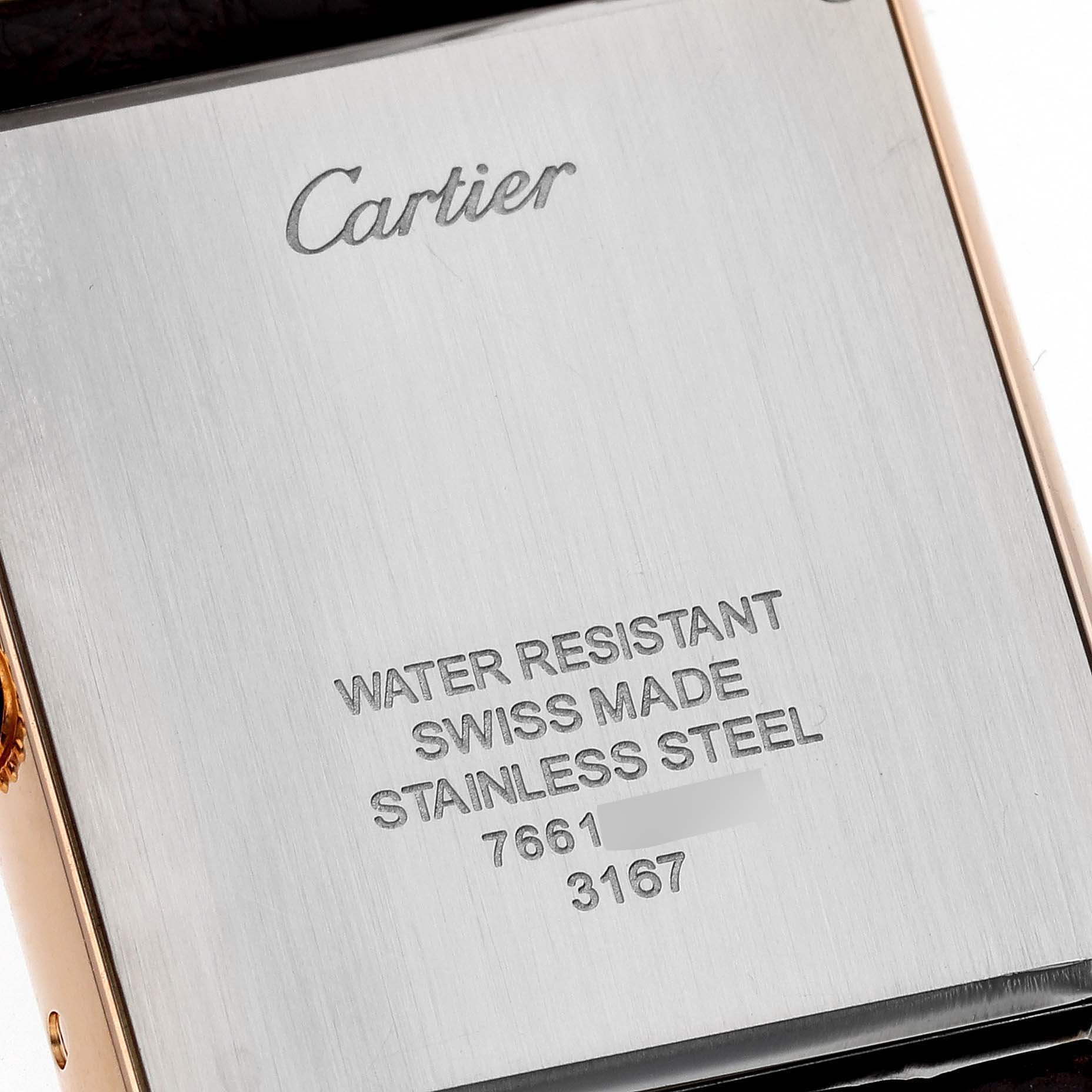 This image shows the engraved back case of a Cartier Tank Solo W5200025 Men's Steel and Gold (two tone) Silver Dial W5200025 Men's Steel and Gold (two tone) Silver Dial watch.