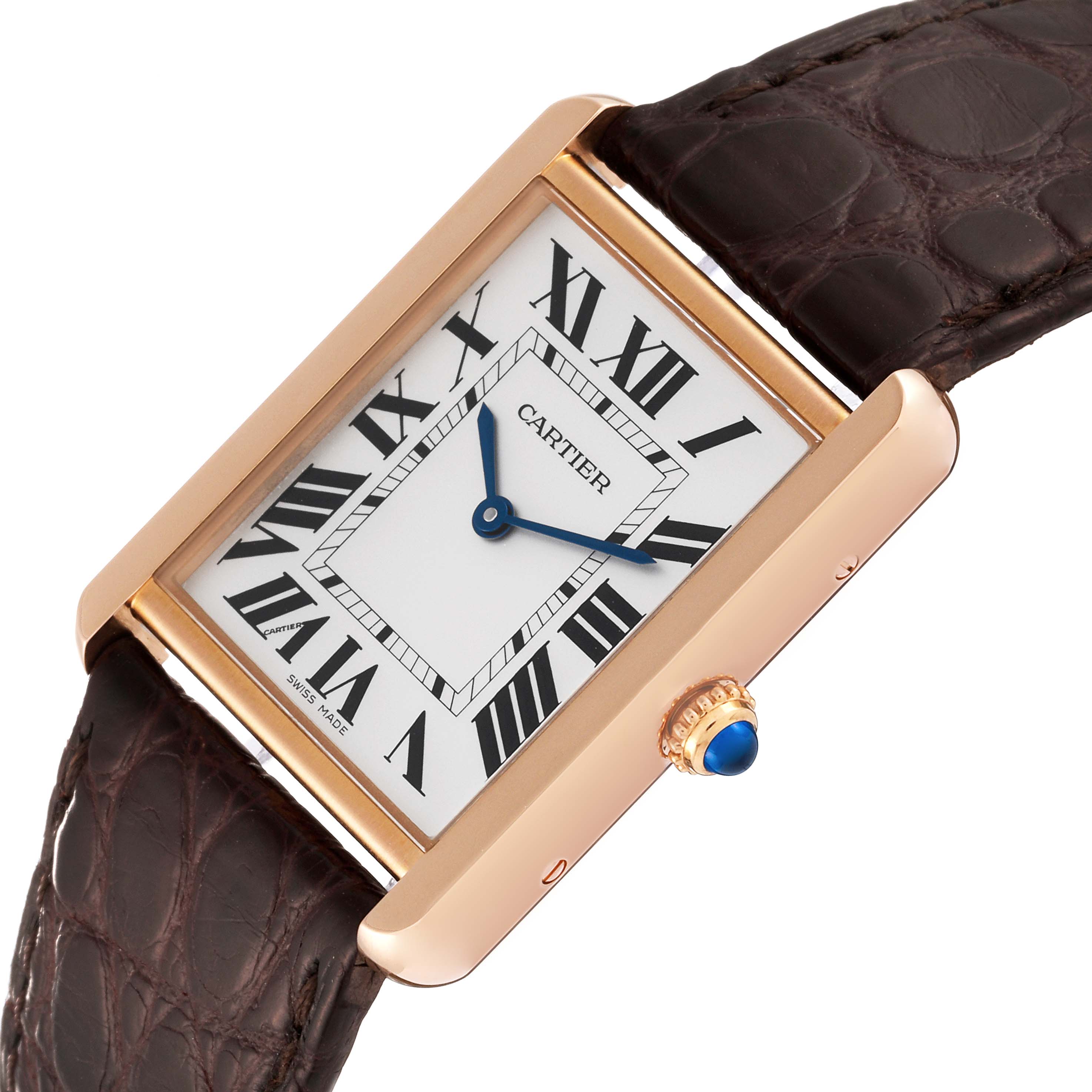 The Cartier Tank Solo W5200025 Men's Steel and Gold (two tone) Silver Dial W5200025 Men's Steel and Gold (two tone) Silver Dial watch is shown at an angle emphasizing its rectangular face, Roman numerals, blue hands, and alligator leather strap.