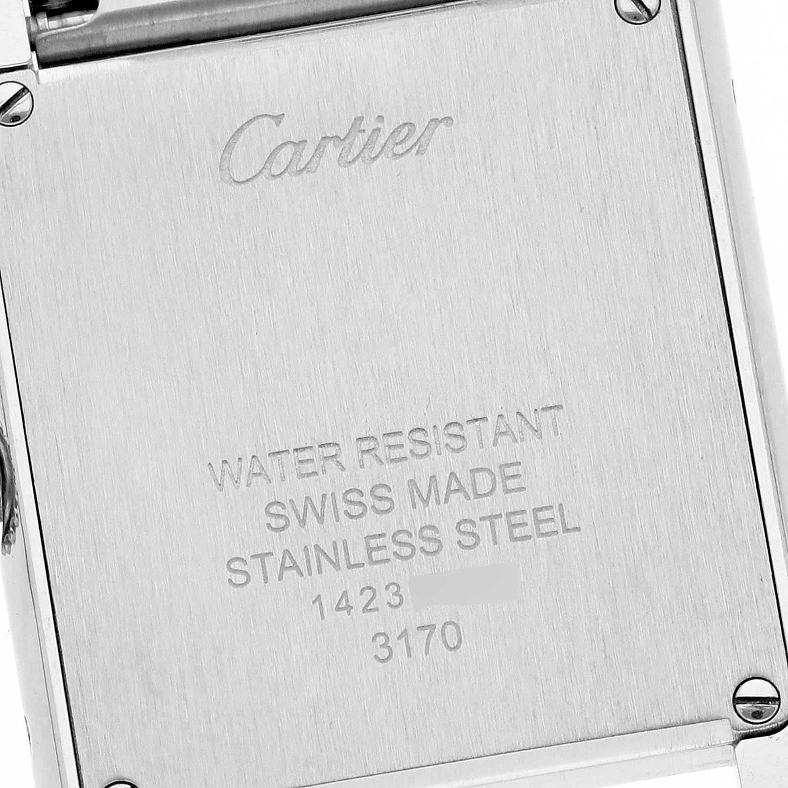 The image shows the back case of a Cartier Tank Solo W5200013 Women
s Stainless Steel Silver Dial W5200013 Women
s Stainless Steel Silver Dial watch, highlighting the brand engraving and specifications.