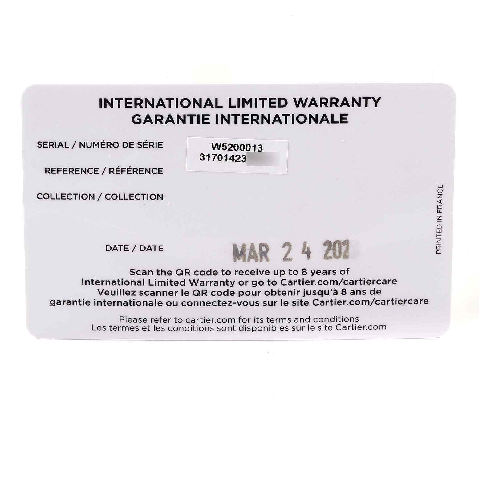 The image shows the international limited warranty card for a Cartier Tank Solo W5200013 Women
s Stainless Steel Silver Dial W5200013 Women
s Stainless Steel Silver Dial watch, with serial and reference numbers.