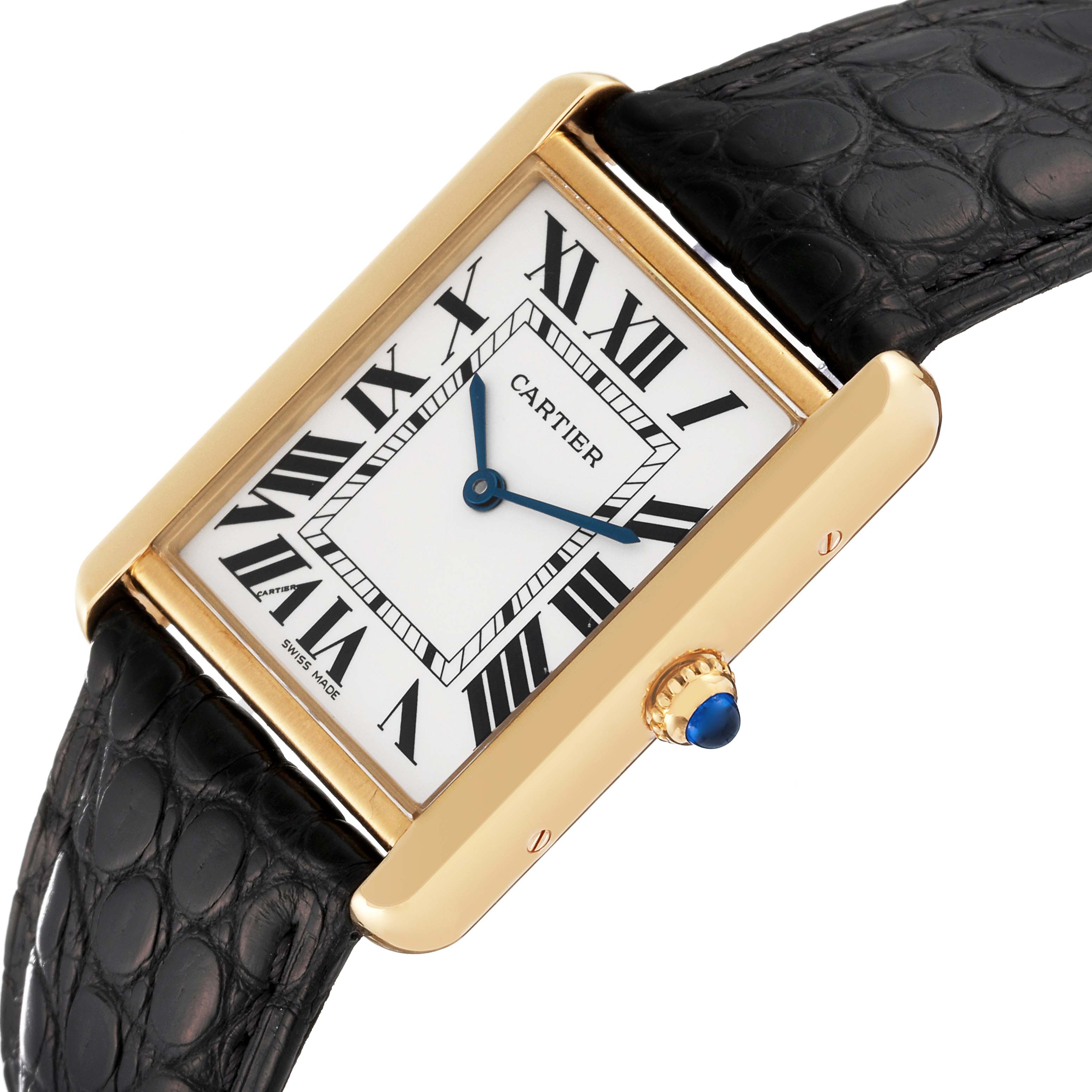 The image shows a close-up view of the Cartier Tank Solo W1018855 Men
s Steel and Gold (two tone) Silver Dial W1018855 Men
s Steel and Gold (two tone) Silver Dial watch, focusing on the face, crown, and leather strap.