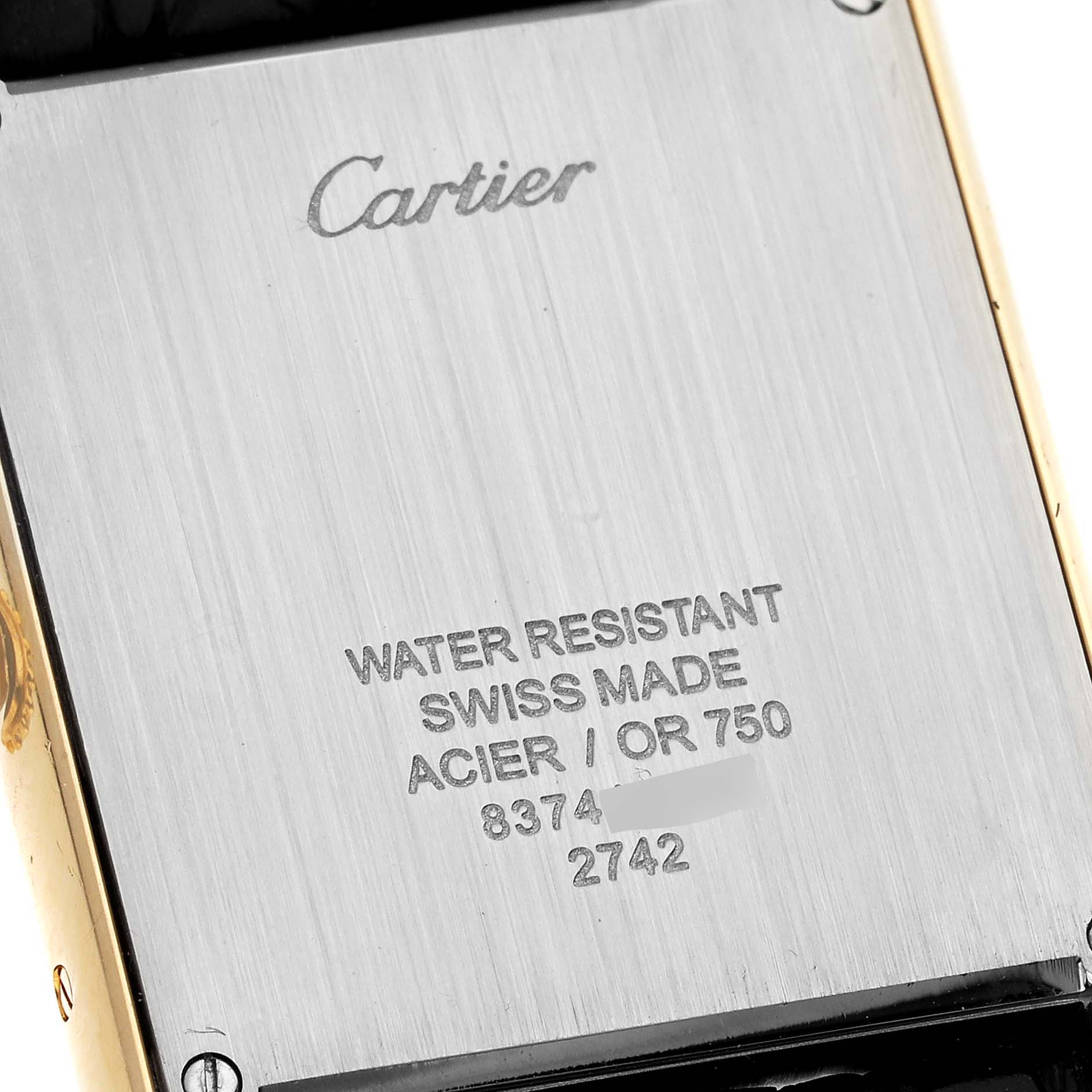 This image shows the back of the Tank Solo watch by Cartier, displaying the brand name and specifications.