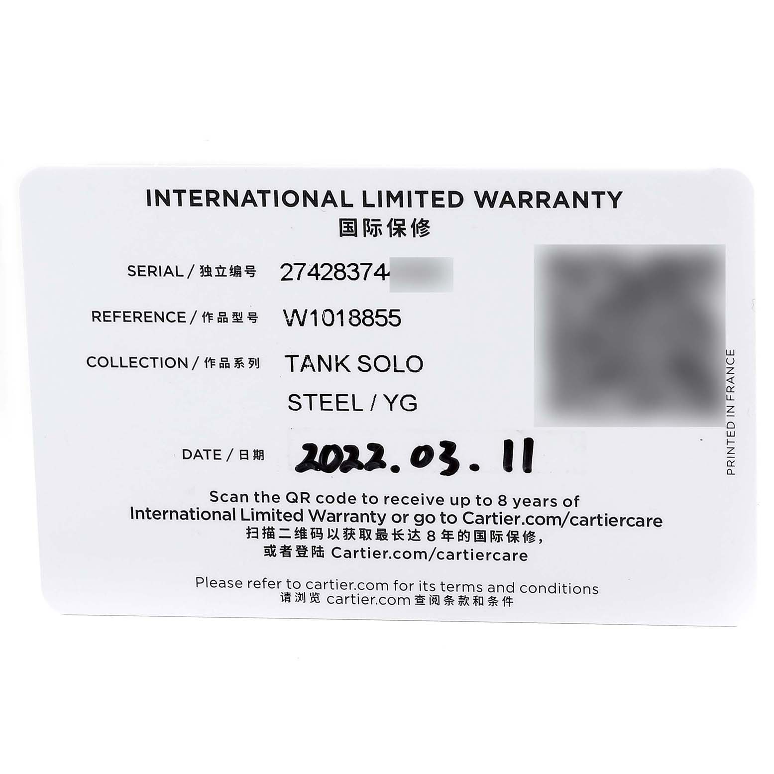 The image shows the international limited warranty card for the Tank Solo model by Cartier, including details like serial and reference numbers.