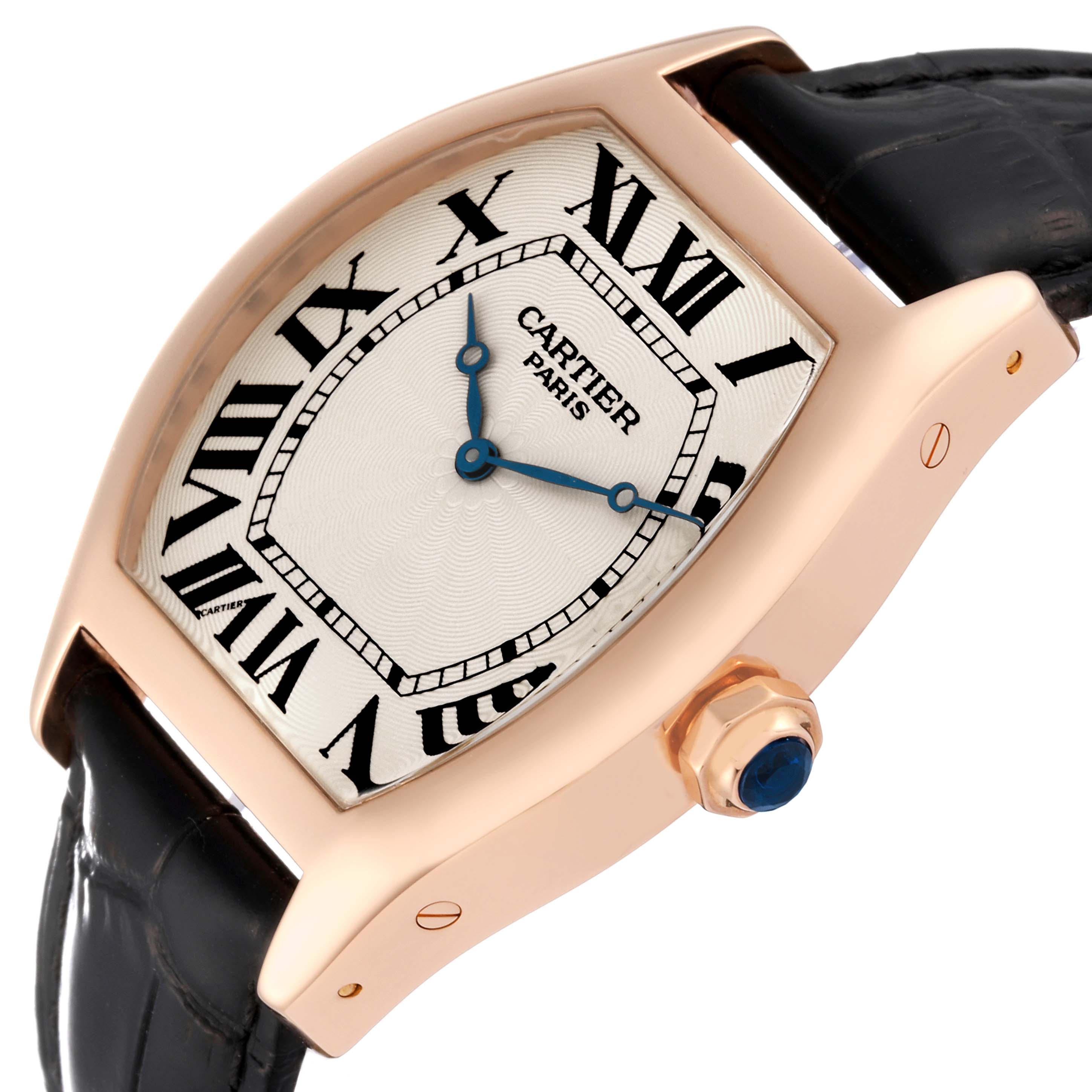 The image shows a side angle of the Cartier Tortue W1546051 Men's Rose Gold Silver Dial W1546051 Men's Rose Gold Silver Dial watch, highlighting the face, crown, and part of the leather strap.