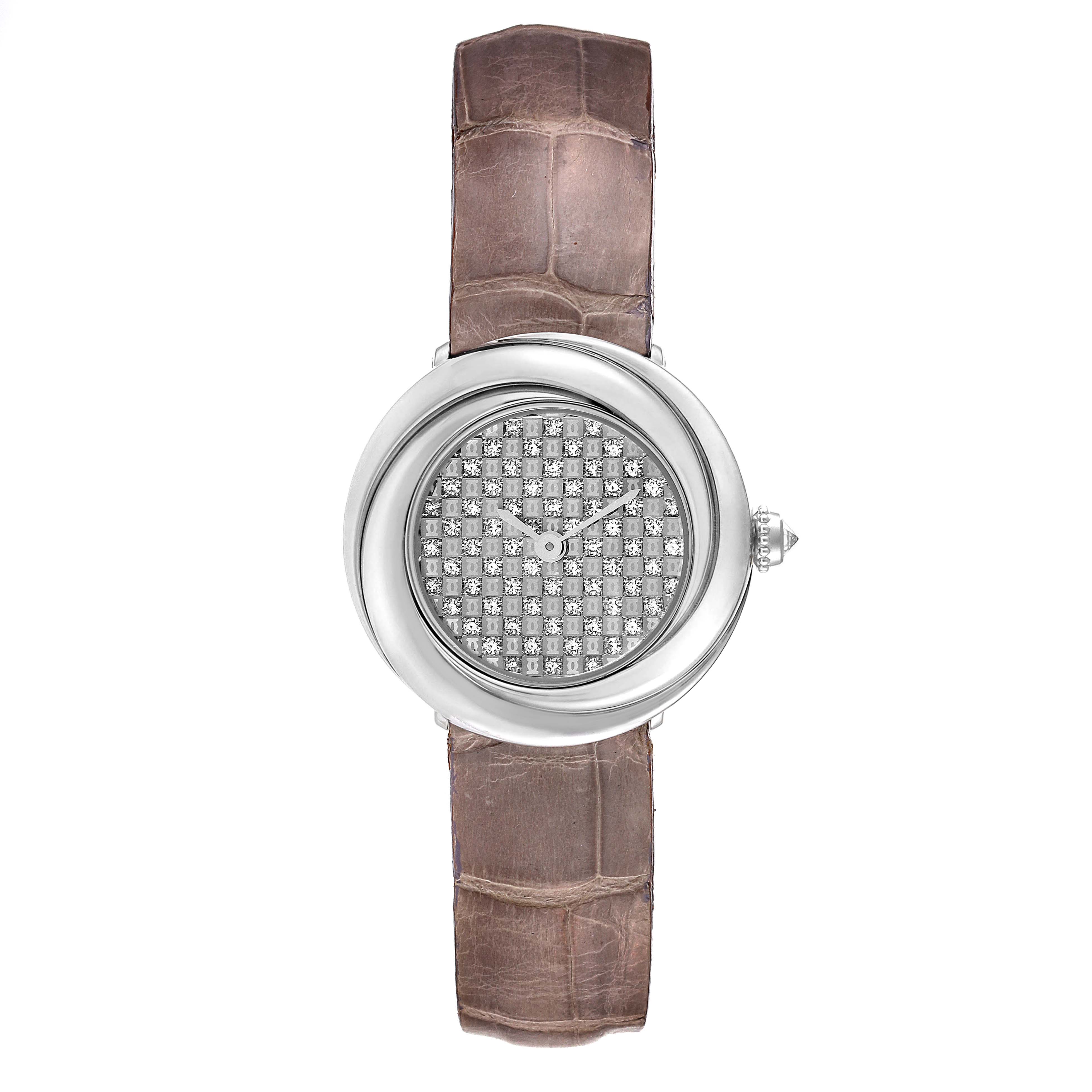 The Cartier Trinity WG201156 Women's White Gold  WG201156 Women's White Gold  model watch is shown from a top-down angle, displaying its face, bezel, and leather strap.