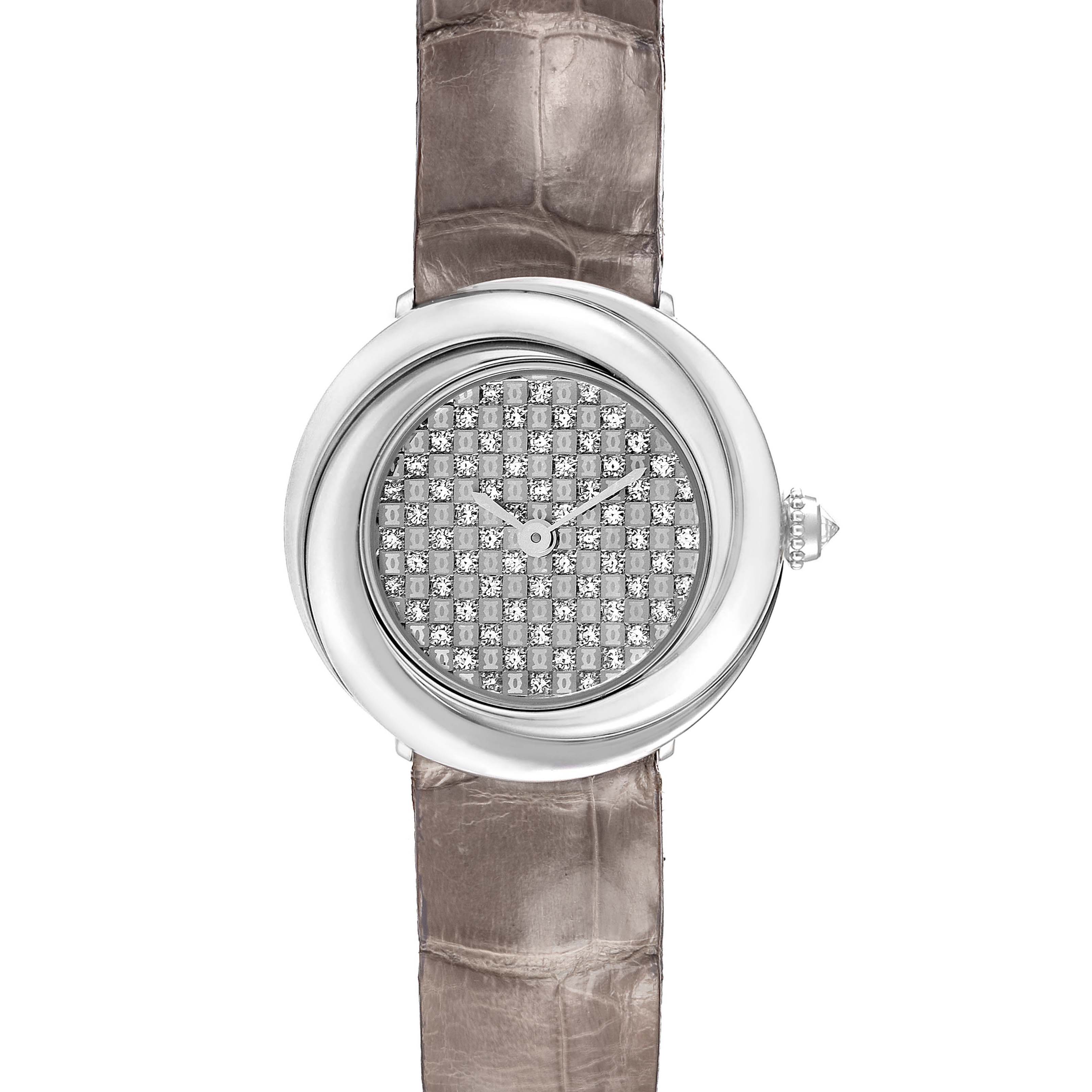 The Cartier Trinity WG201156 Women's White Gold  watch is shown from a top-down angle, displaying its diamond-encrusted face and leather strap.
