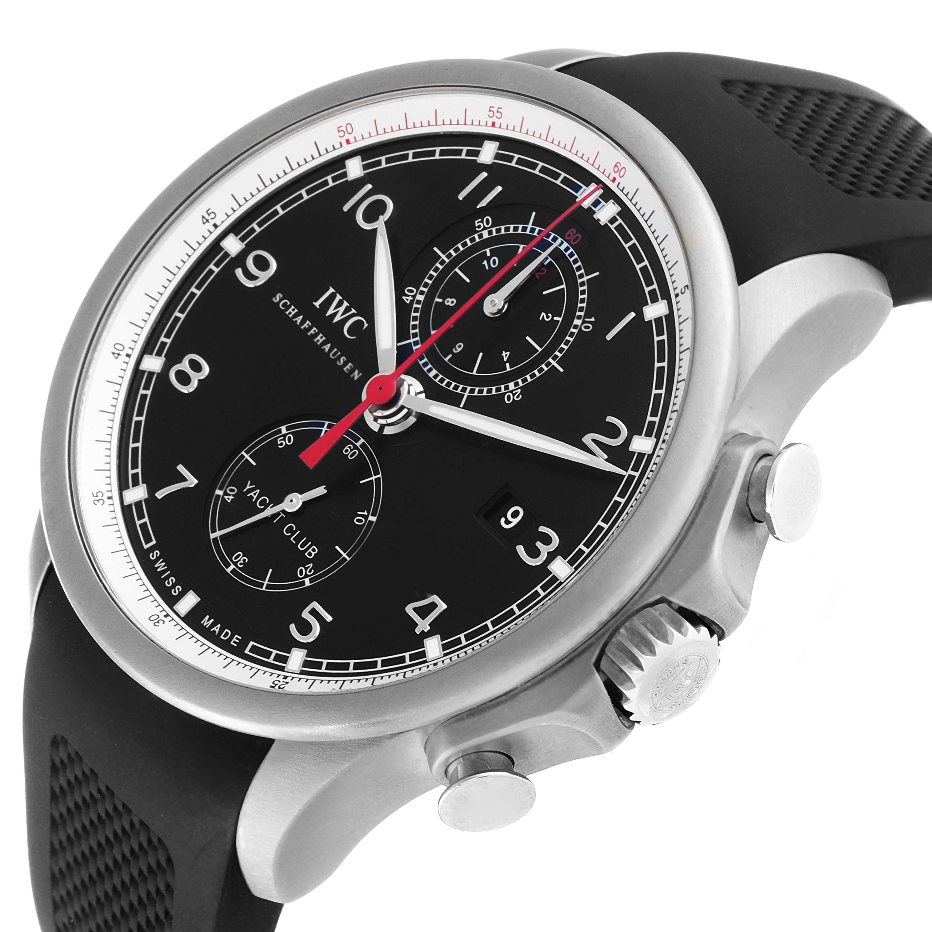 The image shows a side angle view of the IWC Portuguese IW390212 Men's Titanium Black Dial IW390212 Men's Titanium Black Dial model watch, highlighting the black dial, chronograph subdials, and rubber strap.