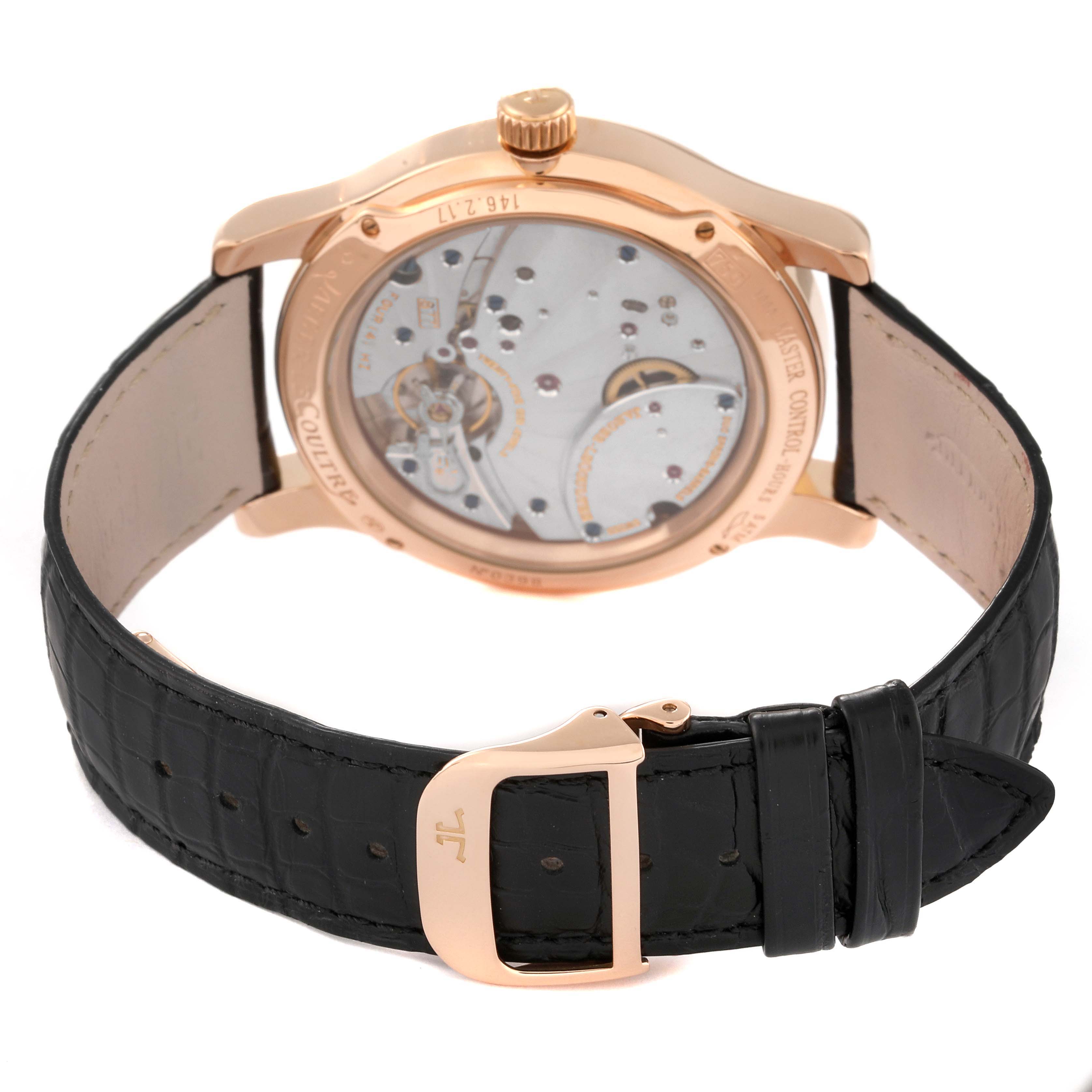 The image shows the back of a Jaeger LeCoultre Master Q1602420 Men's Rose Gold Silver Dial Q1602420 Men's Rose Gold Silver Dial model watch focusing on its transparent case back and black leather strap.