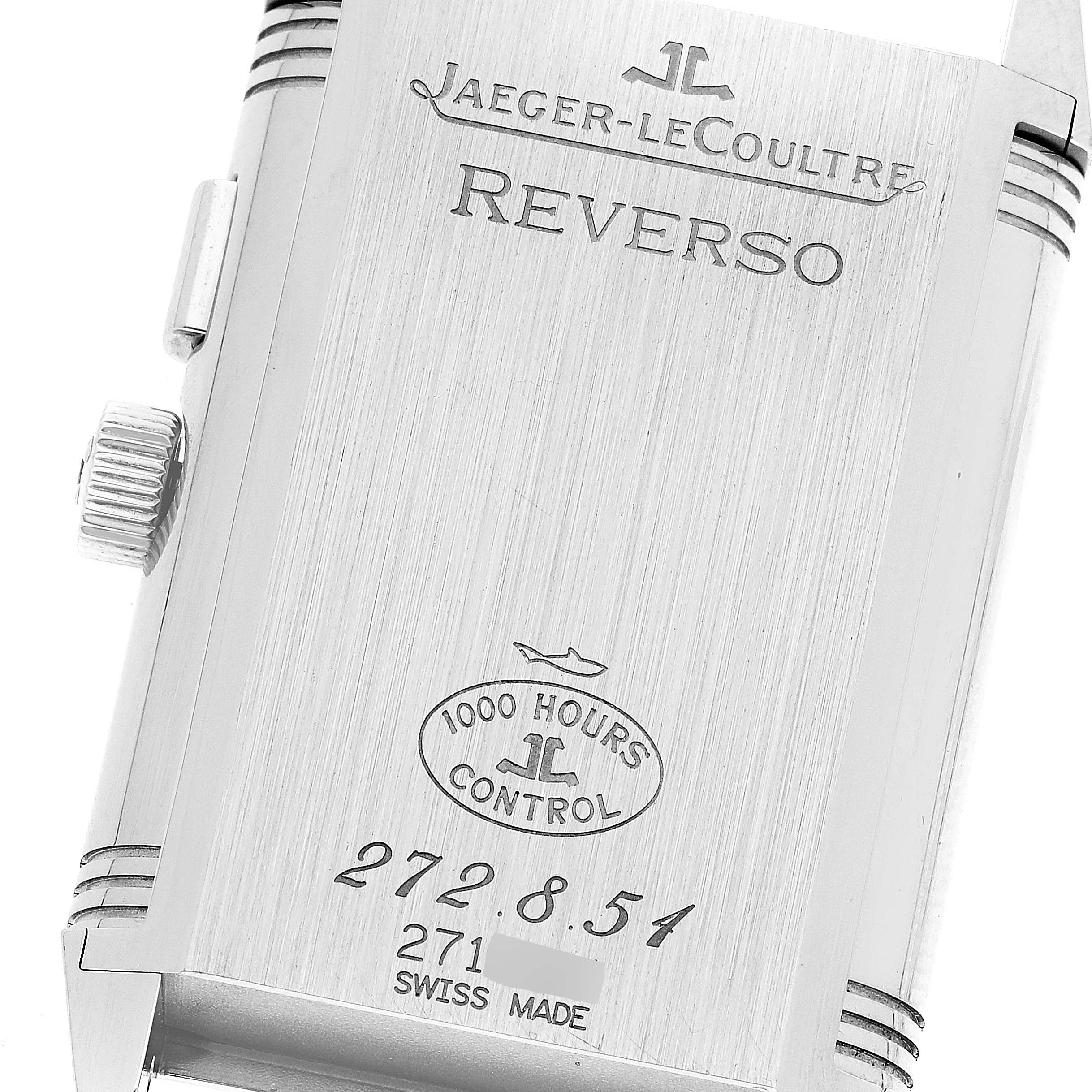 The image shows the back case of a Jaeger-LeCoultre Reverso watch with its inscriptions and control certification.