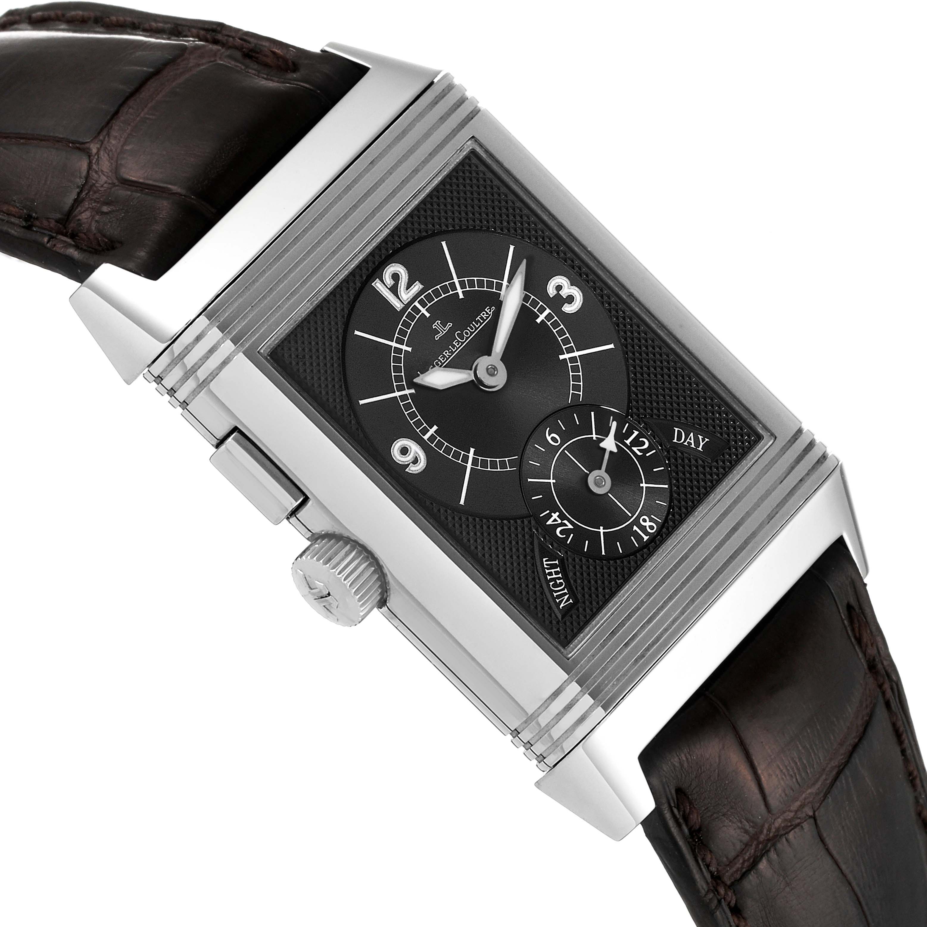 The Jaeger-LeCoultre Reverso watch is shown at an angled close-up highlighting its face, side crown, and leather strap.