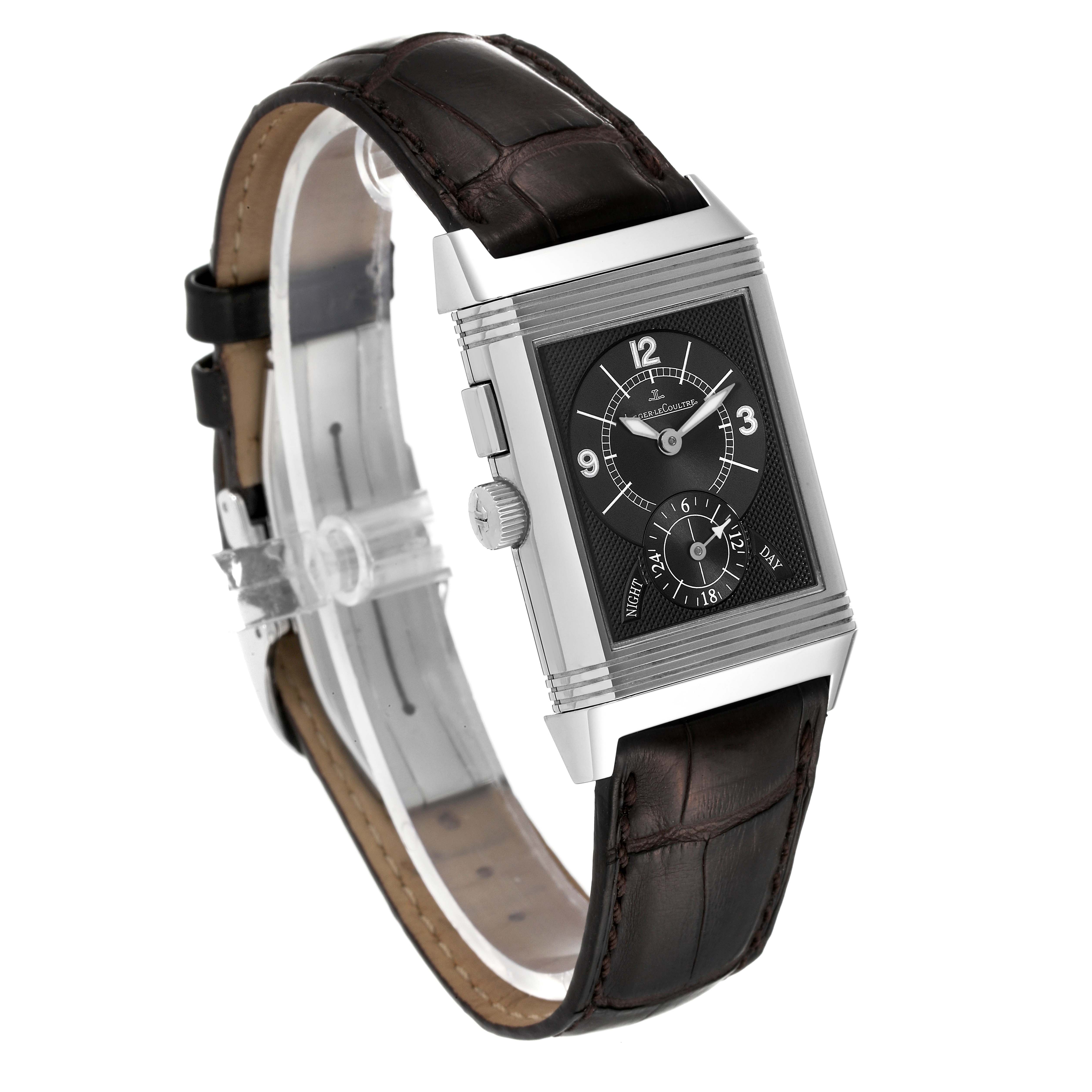 The image shows a Jaeger LeCoultre Reverso Q2718410 Men's Stainless Steel Silver Dial Q2718410 Men's Stainless Steel Silver Dial watch in a three-quarter side angle, highlighting the face, crown, and leather strap.