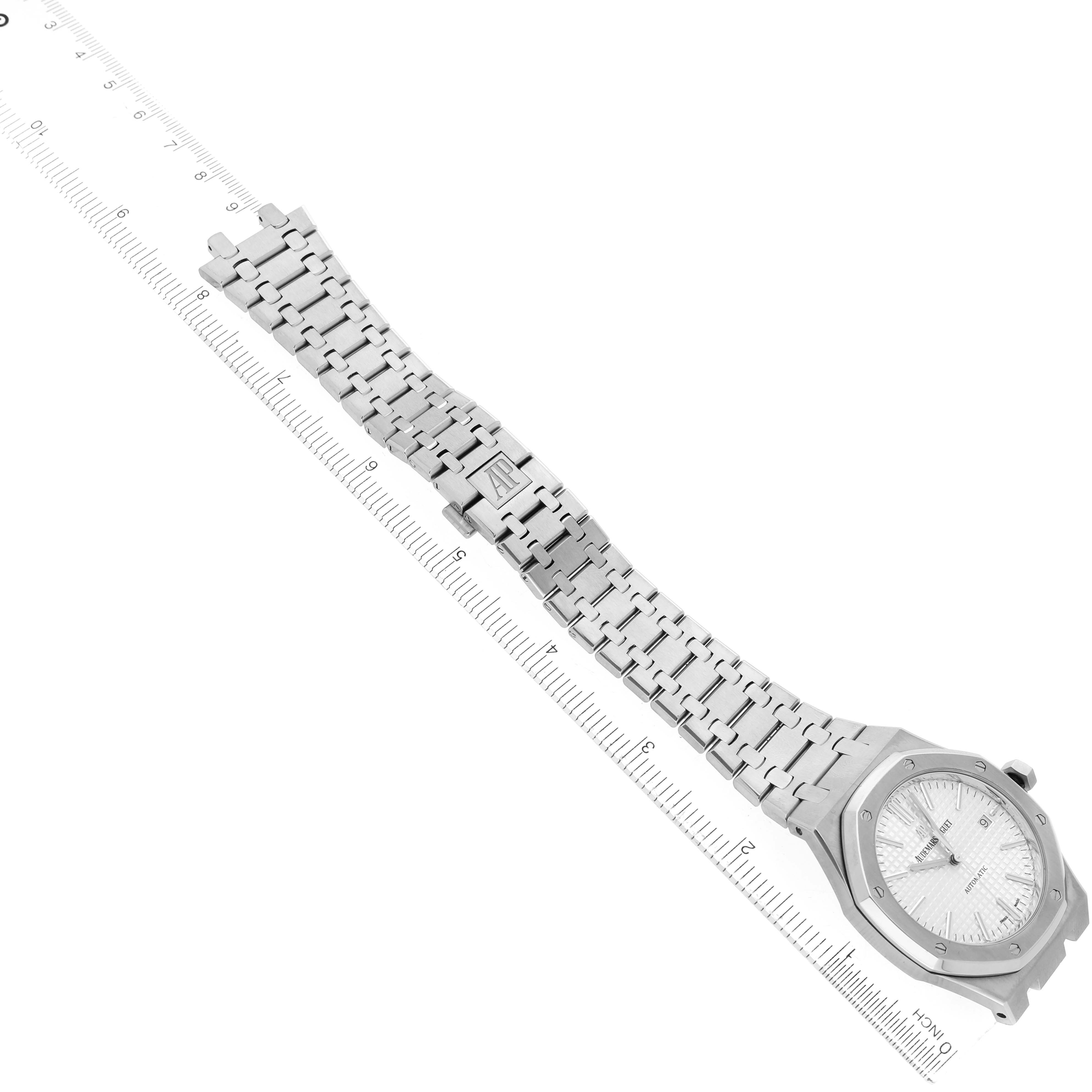 The image shows the Audemars Piguet Royal Oak 15400ST.OO.1220ST.02 Men's Stainless Steel Silver Dial watch at an angled top view, highlighting the case, dial, and bracelet against a ruler.