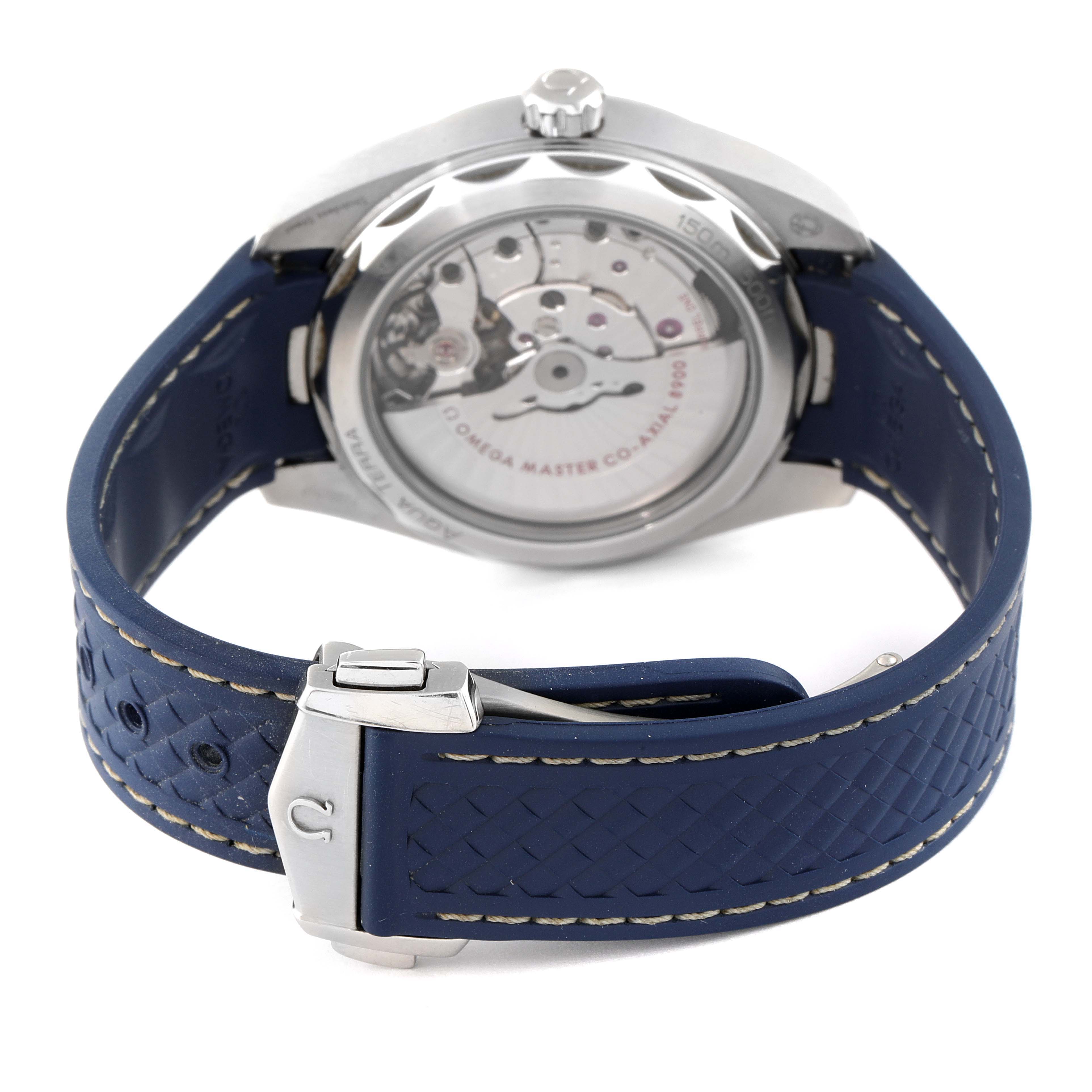 This image shows the back view of the Omega Aqua Terra 220.12.41.21.03.001 Men's Stainless Steel Blue Dial 220.12.41.21.03.001 Men's Stainless Steel Blue Dial watch, highlighting its movement mechanism and blue strap with clasp.