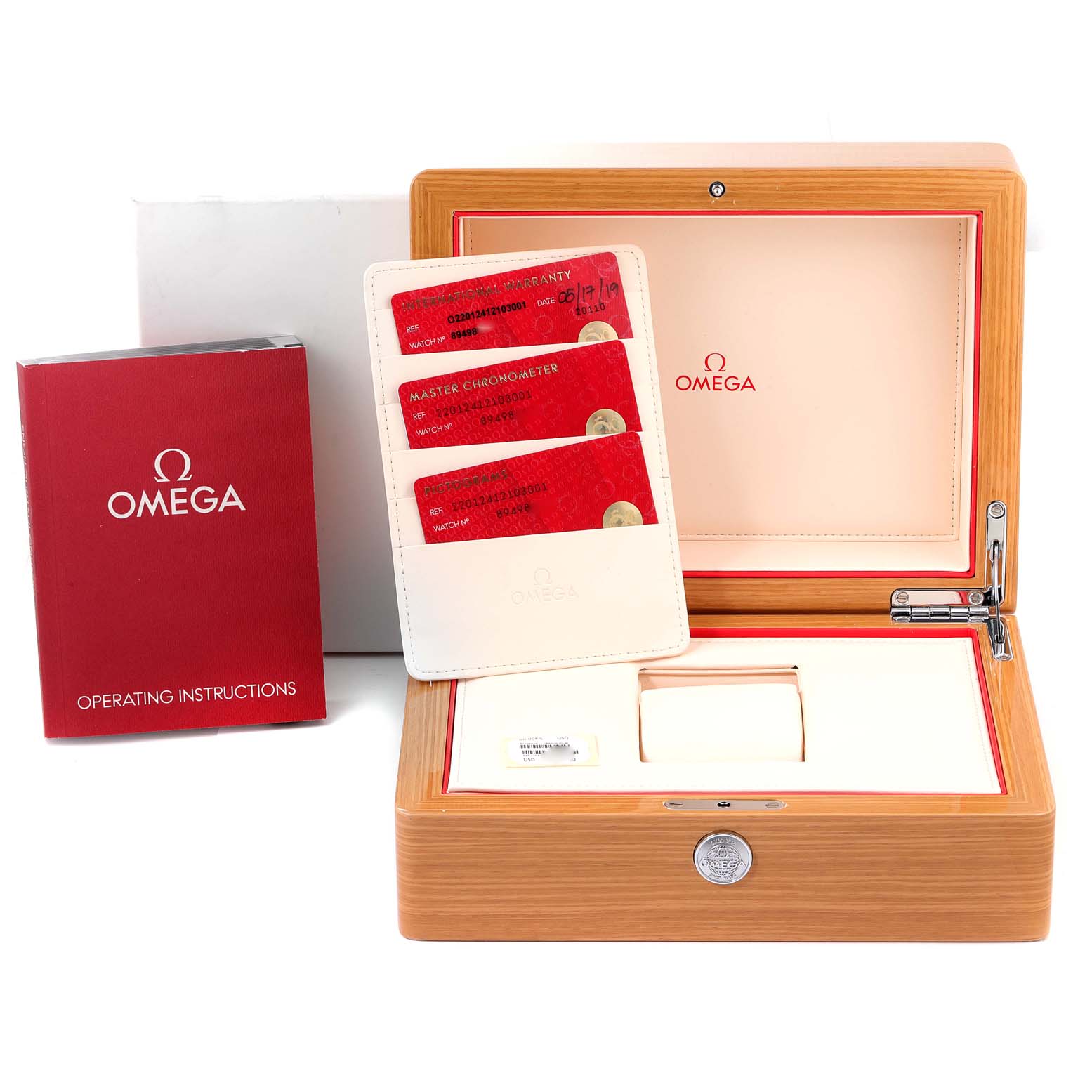 The image shows the packaging and accessories for the Omega Aqua Terra 220.12.41.21.03.001 Men's Stainless Steel Blue Dial 220.12.41.21.03.001 Men's Stainless Steel Blue Dial watch, including the watch box, cards, and instruction manual.