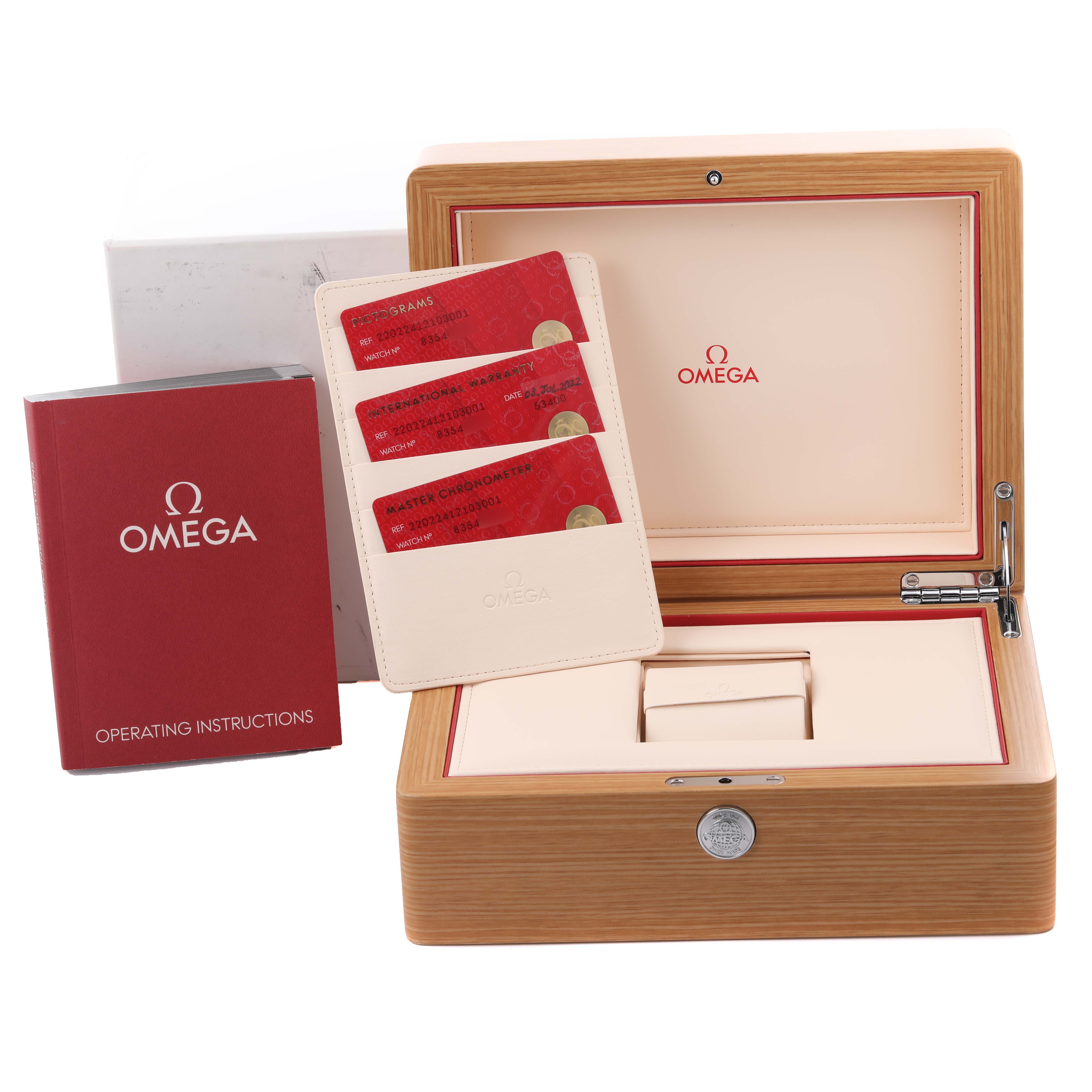 The image shows the Omega Aqua Terra 220.22.41.21.03.001 Men's Steel and Gold (two tone) Blue Dial 220.22.41.21.03.001 Men's Steel and Gold (two tone) Blue Dial box open, along with red operating instructions and warranty cards.