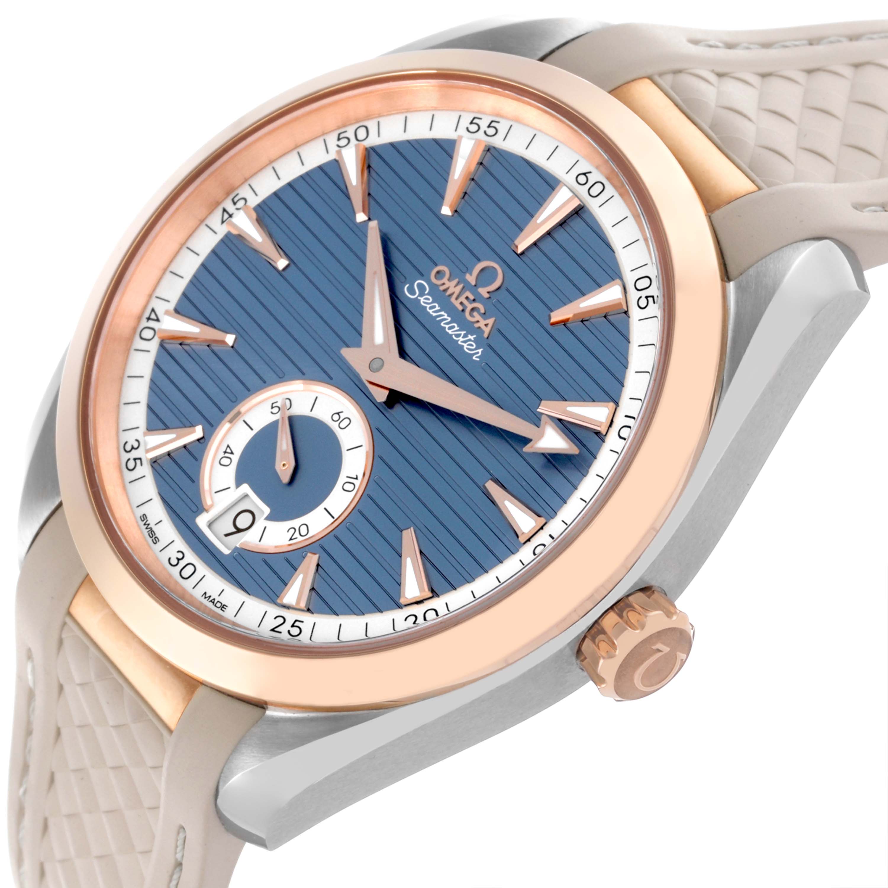 The Omega Aqua Terra 220.22.41.21.03.001 Men's Steel and Gold (two tone) Blue Dial 220.22.41.21.03.001 Men's Steel and Gold (two tone) Blue Dial watch is shown at an angled close-up, highlighting its blue dial, rose gold accents, and textured strap.