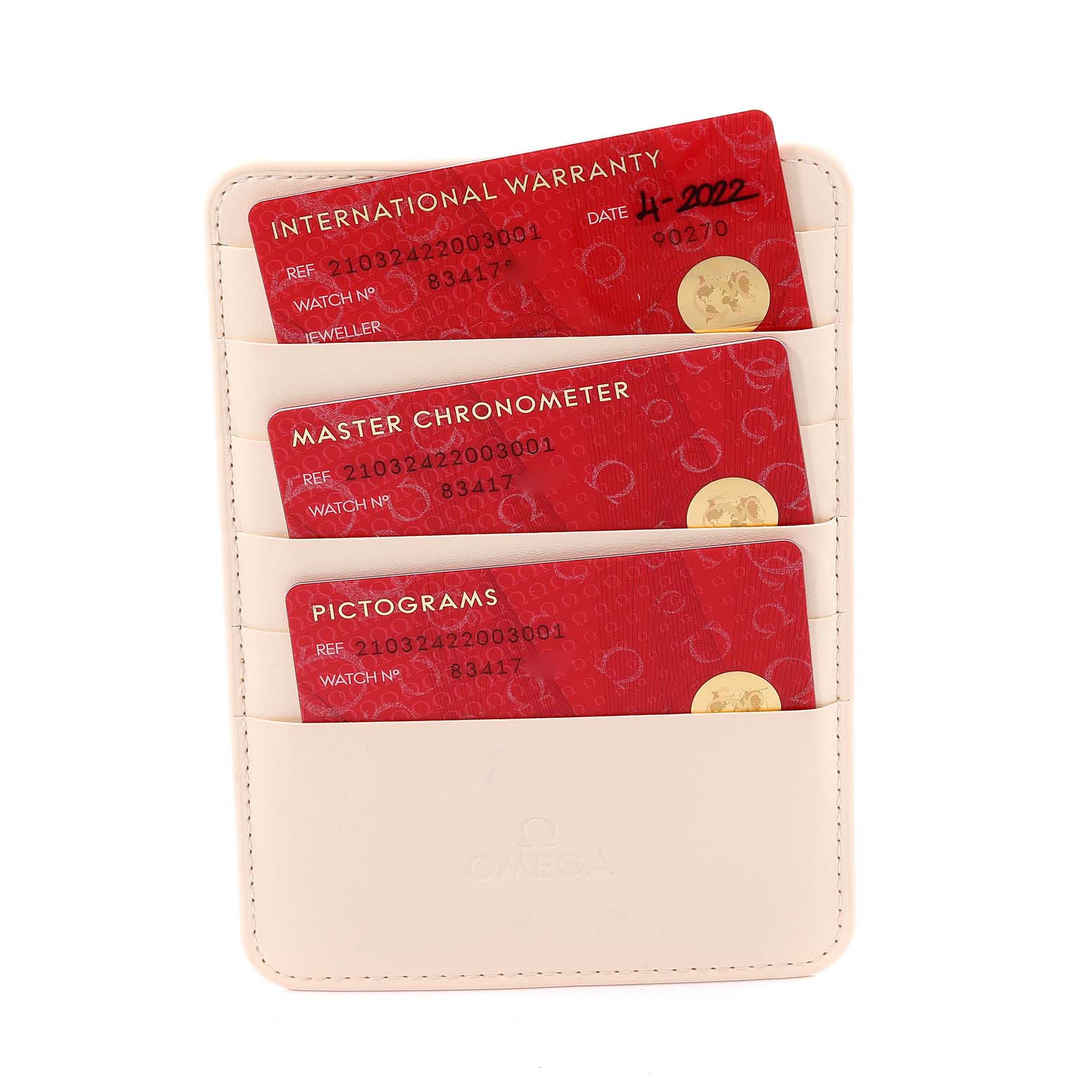 The image shows three red warranty and certification cards in a beige holder for an Omega Seamaster 210.32.42.20.03.001 Men's Stainless Steel Blue Dial 210.32.42.20.03.001 Men's Stainless Steel Blue Dial watch.