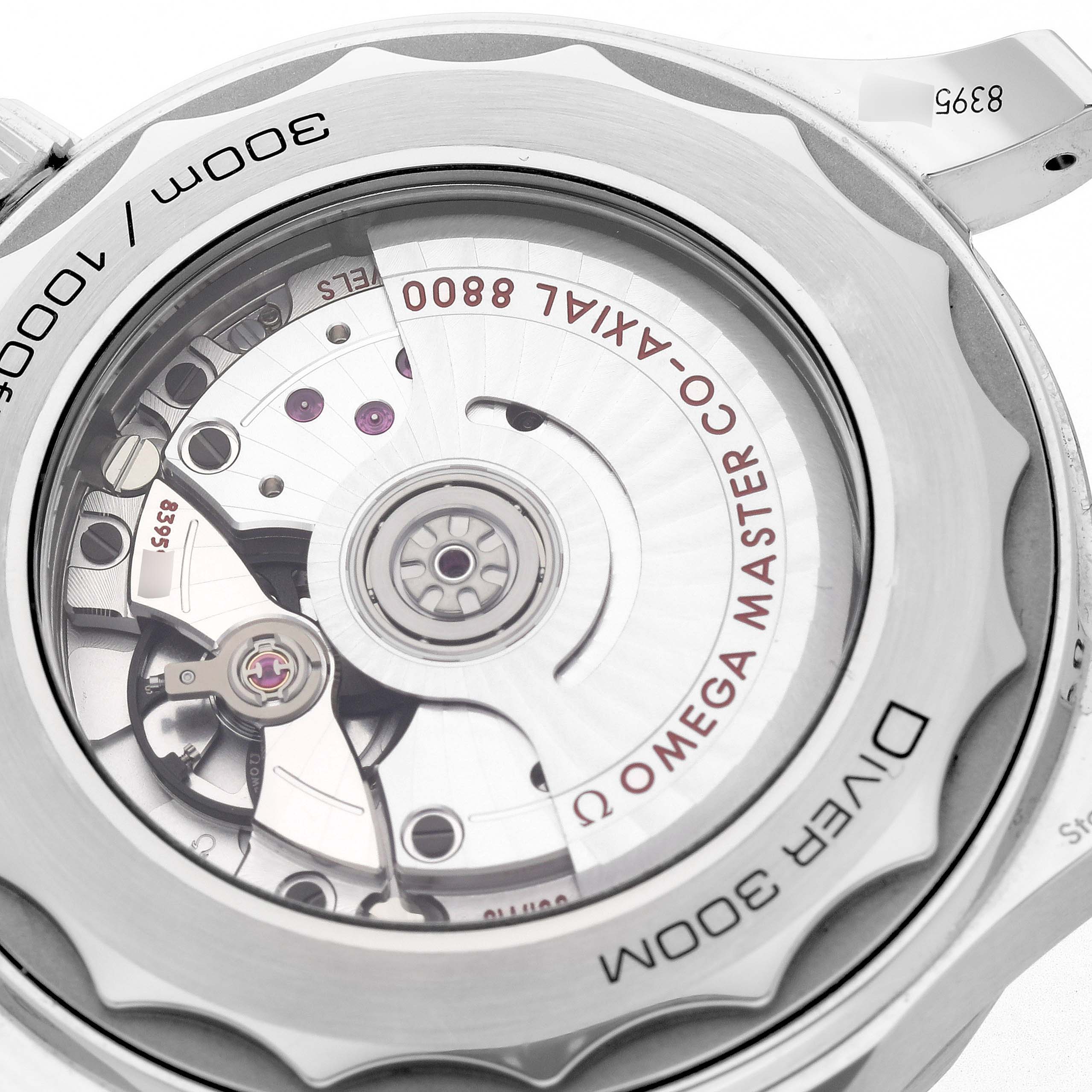 The image shows the back of the Omega Seamaster 210.30.42.20.01.001 Men
s Stainless Steel Black Dial 210.30.42.20.01.001 Men
s Stainless Steel Black Dial watch, highlighting its exposed movement and detailing.