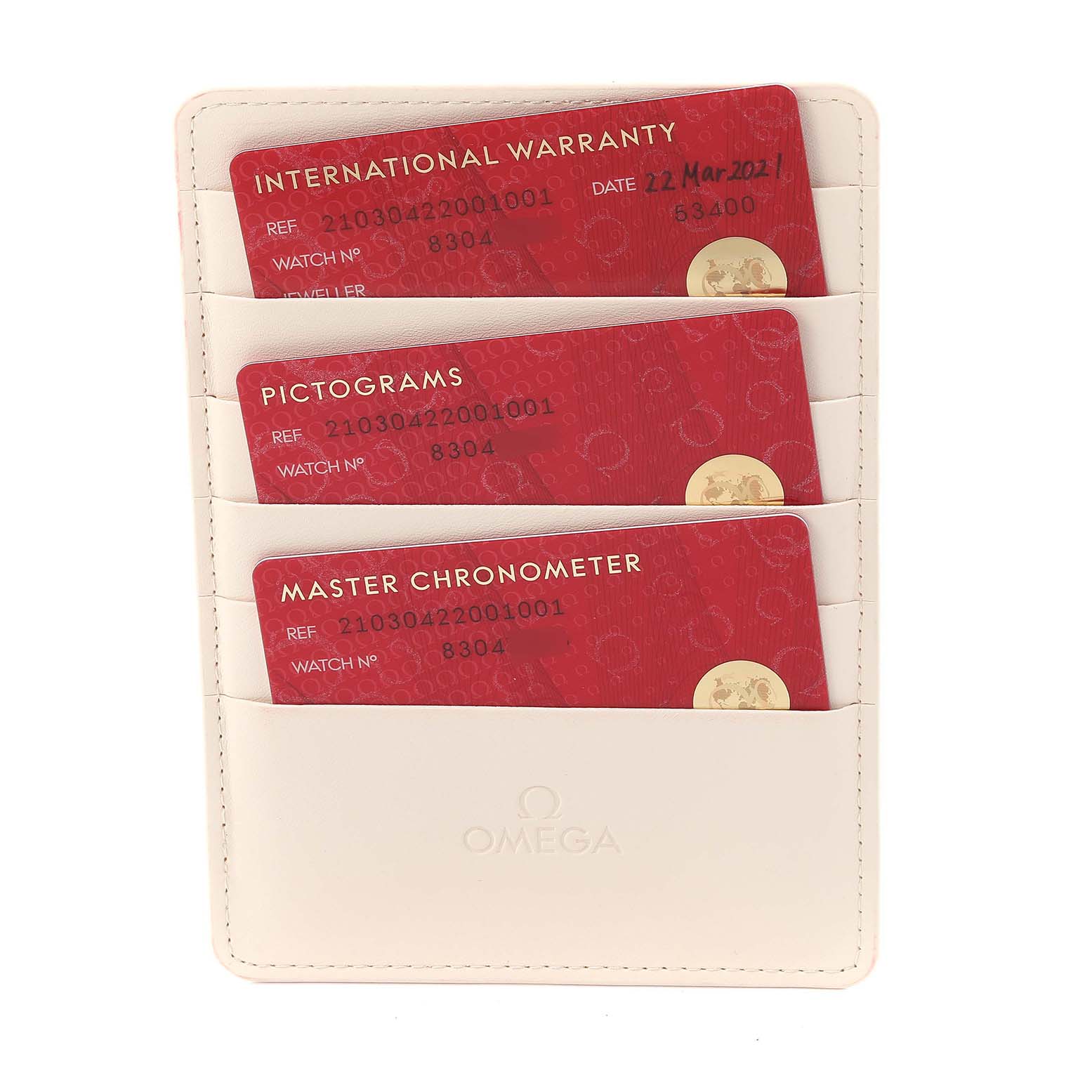 The image shows Omega Seamaster 210.30.42.20.01.001 Men
s Stainless Steel Black Dial 210.30.42.20.01.001 Men
s Stainless Steel Black Dial warranty cards in a white card holder, viewed from above.