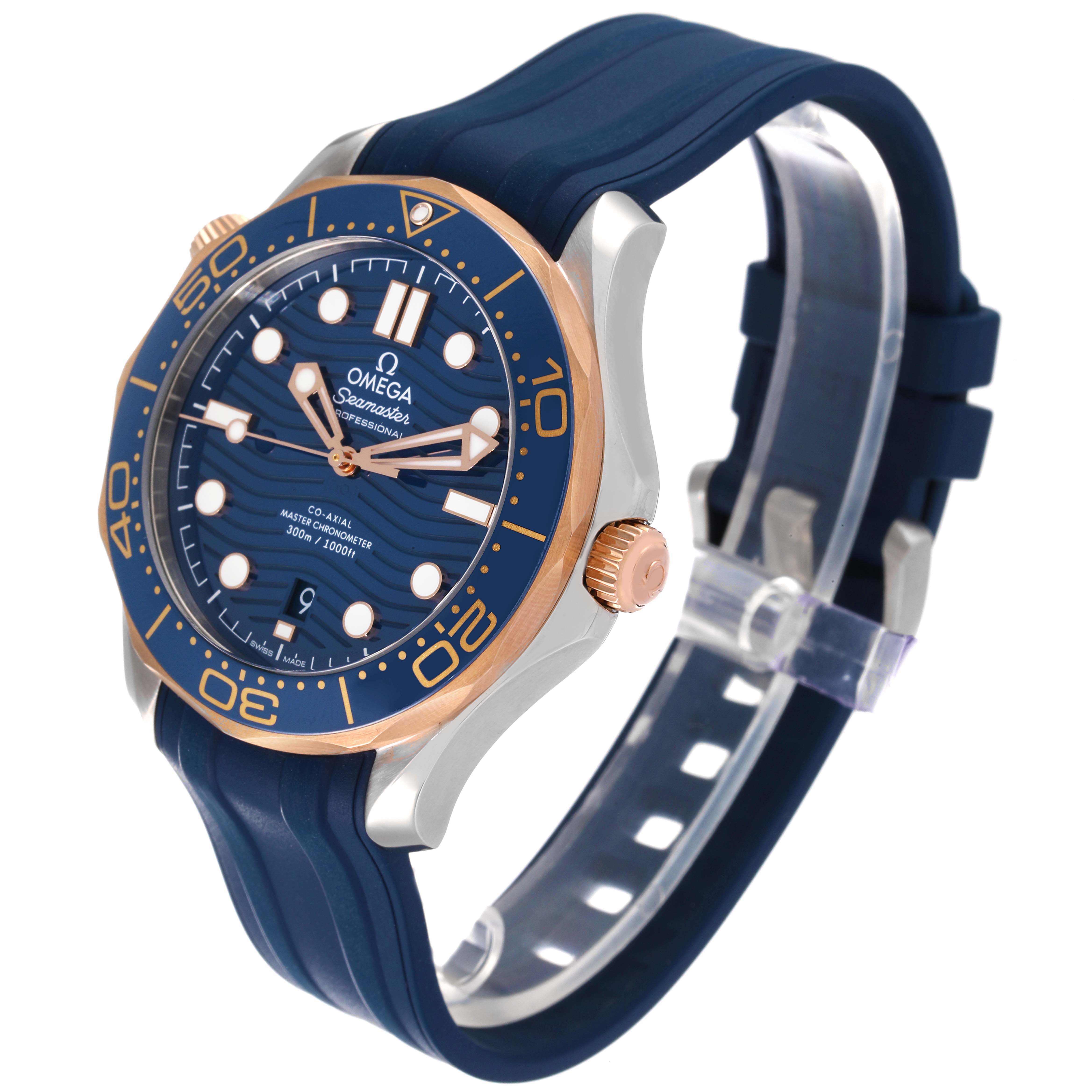 The image shows an angled front view of the Omega Seamaster 210.22.42.20.03.002 Men's Steel and Gold (two tone) Blue Dial 210.22.42.20.03.002 Men's Steel and Gold (two tone) Blue Dial watch, highlighting its blue face, rubber strap, and gold accents on the bezel and crown.
