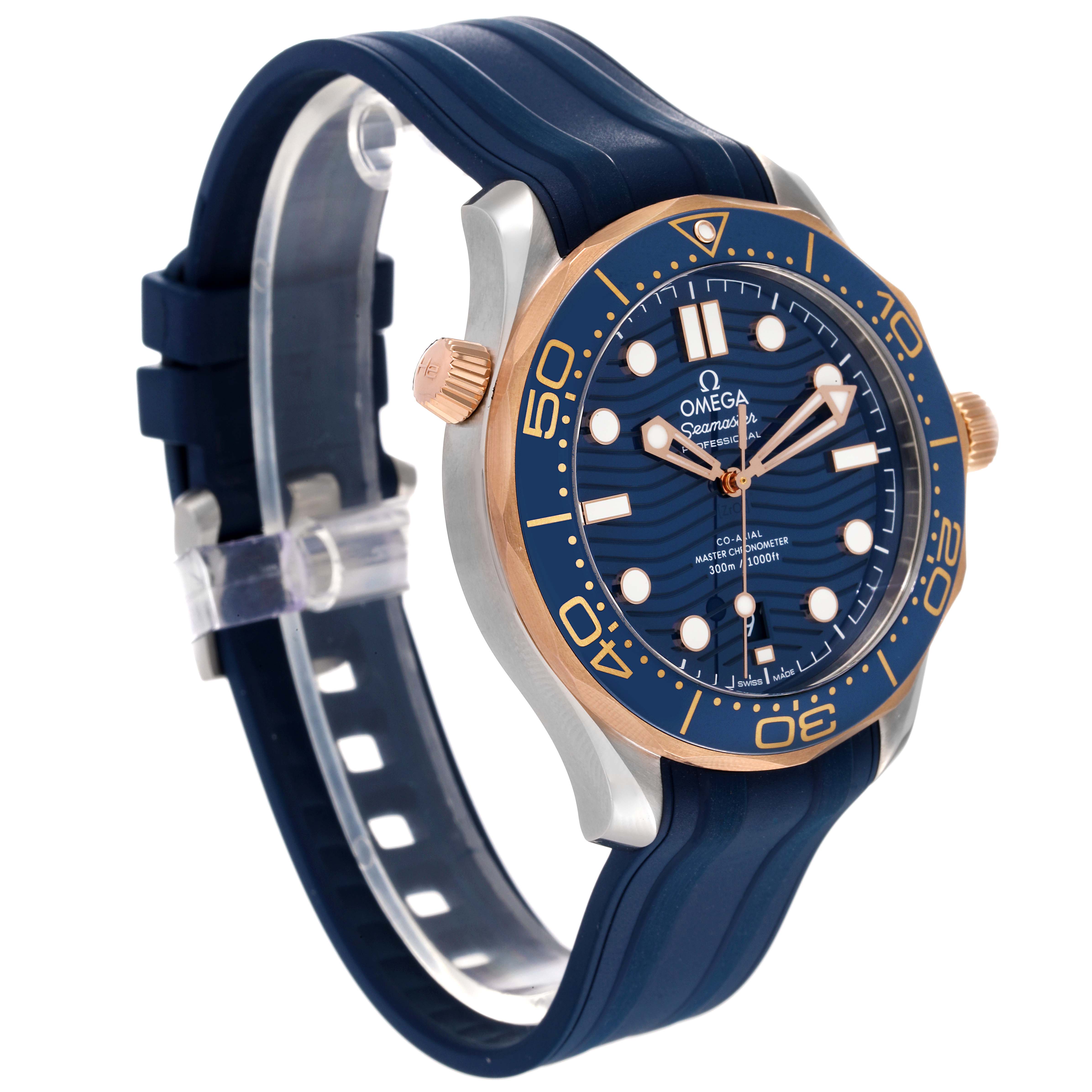 The image shows a side angle of the Omega Seamaster 210.22.42.20.03.002 Men's Steel and Gold (two tone) Blue Dial 210.22.42.20.03.002 Men's Steel and Gold (two tone) Blue Dial watch, highlighting the bezel, dial, crown, and rubber strap.