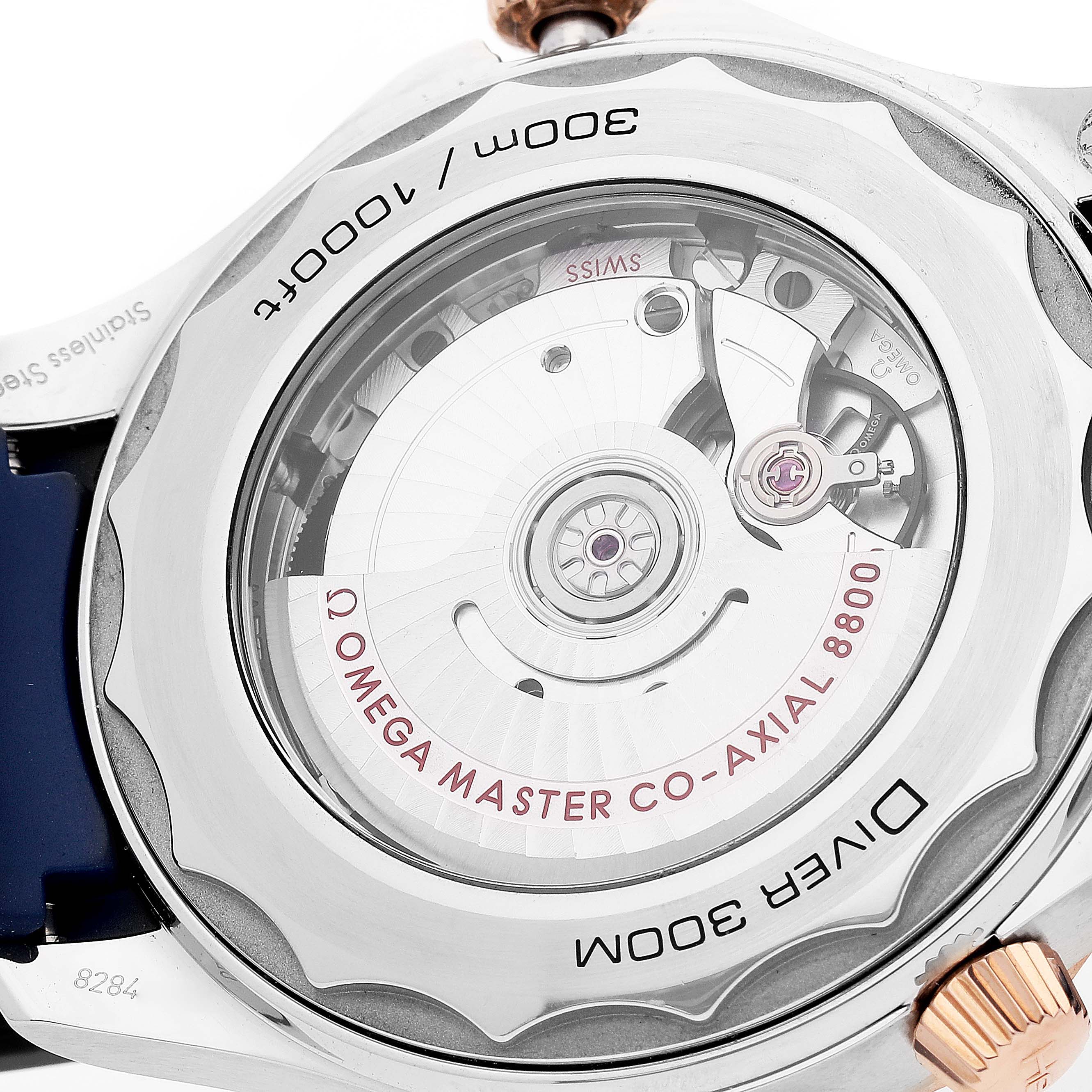 This image shows the rear view of the Omega Seamaster 210.22.42.20.03.002 Men's Steel and Gold (two tone) Blue Dial 210.22.42.20.03.002 Men's Steel and Gold (two tone) Blue Dial watch, highlighting its transparent case back and visible movement.