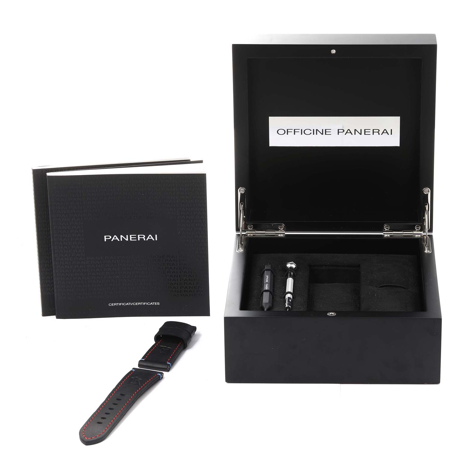 This image shows the Panerai Luminor PAM00726 Men's Titanium Black Dial PAM00726 Men's Titanium Black Dial watch box, strap, tools, and accompanying booklets.