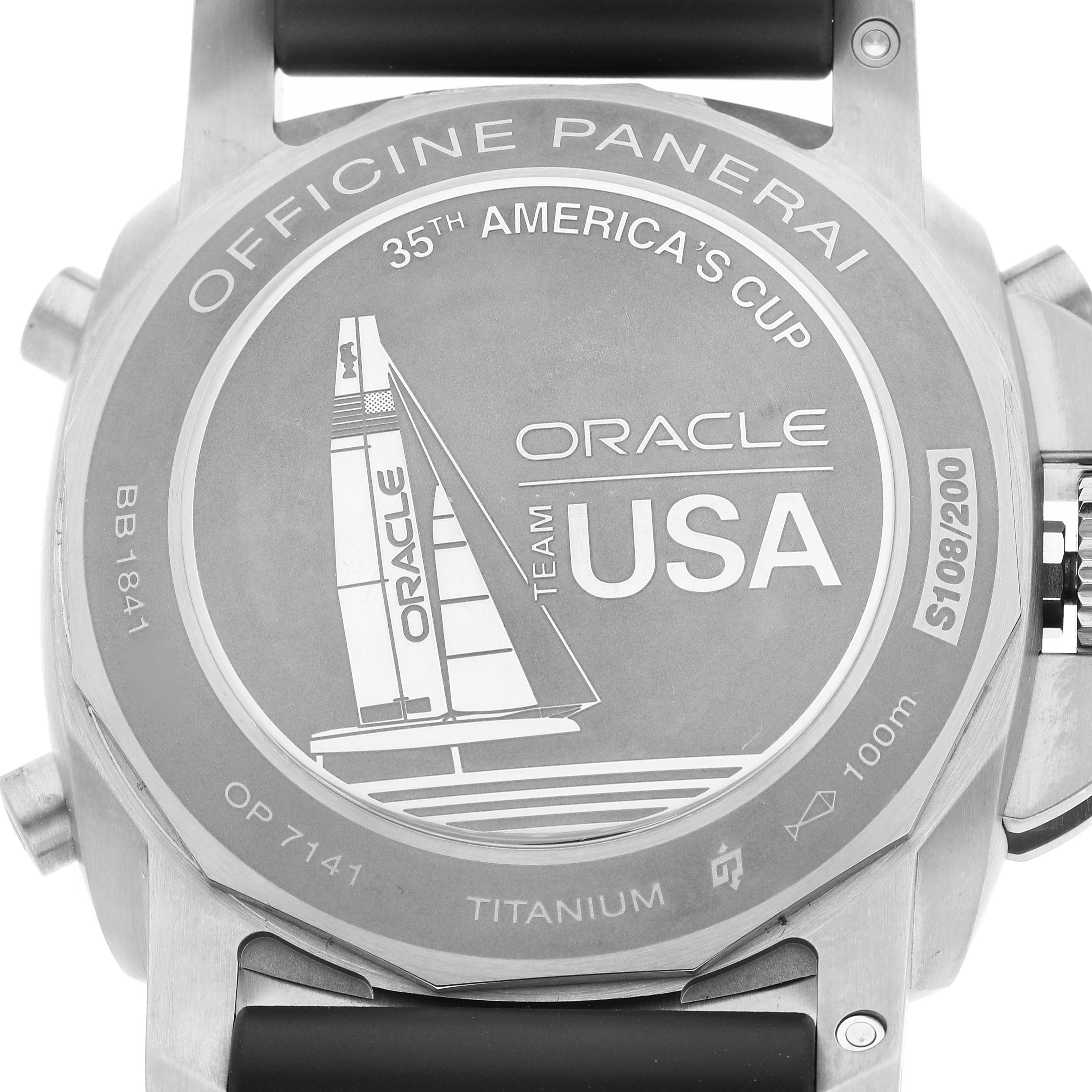 This image shows the back case of the Panerai Luminor PAM00726 Men's Titanium Black Dial PAM00726 Men's Titanium Black Dial watch, highlighting the engraving for the 35th America's Cup and Oracle Team USA.